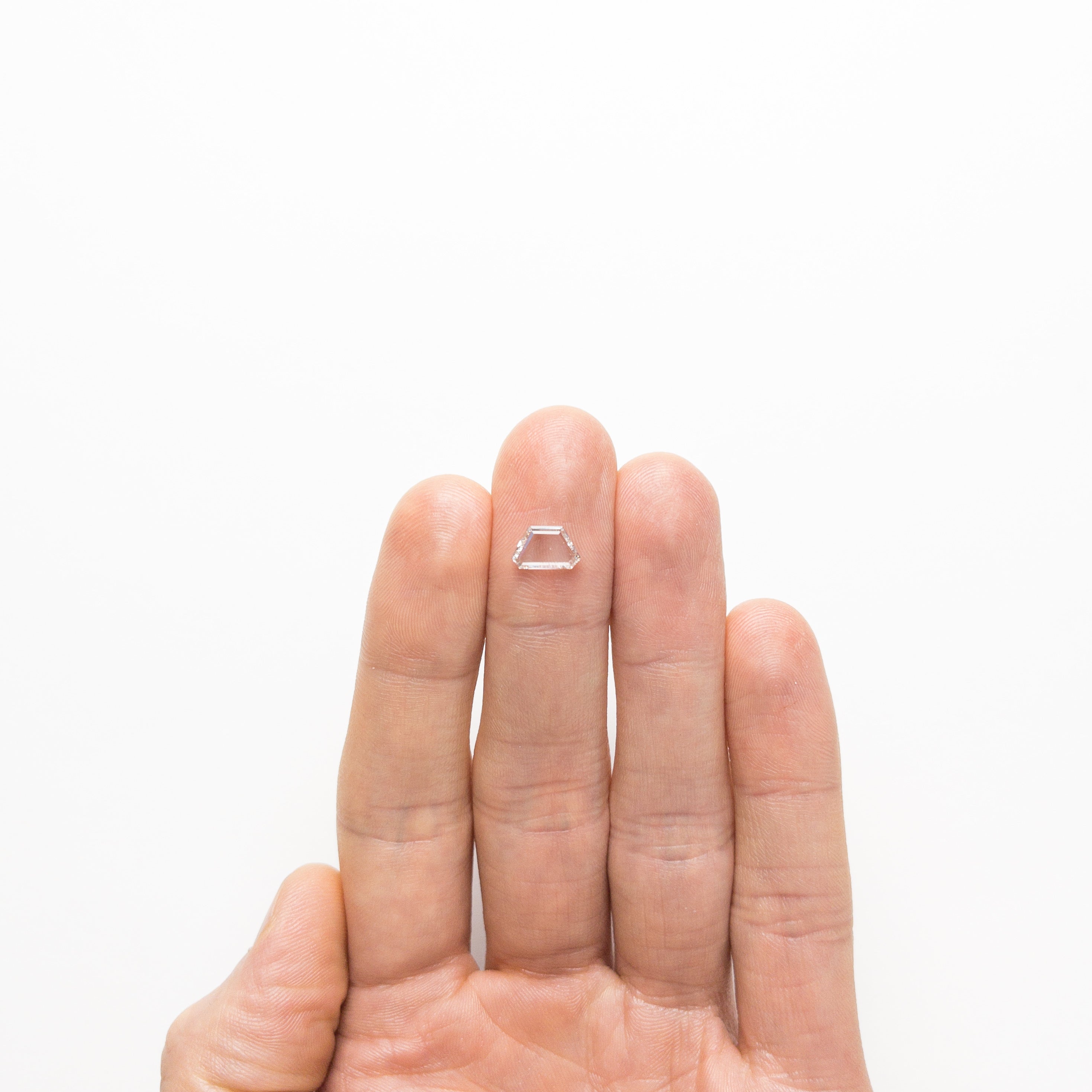 The 0.90ct 5.52x9.06x1.62mm VS2/SI1 E Geometric Portrait Cut 19854-19 by East London jeweller Rachel Boston | Discover our collections of unique and timeless engagement rings, wedding rings, and modern fine jewellery.