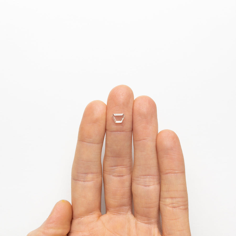 The 0.70ct 8.03x5.43x1.51mm VVS2 J Trapezoid Portrait Cut 19854-23 by East London jeweller Rachel Boston | Discover our collections of unique and timeless engagement rings, wedding rings, and modern fine jewellery. - Rachel Boston Jewellery