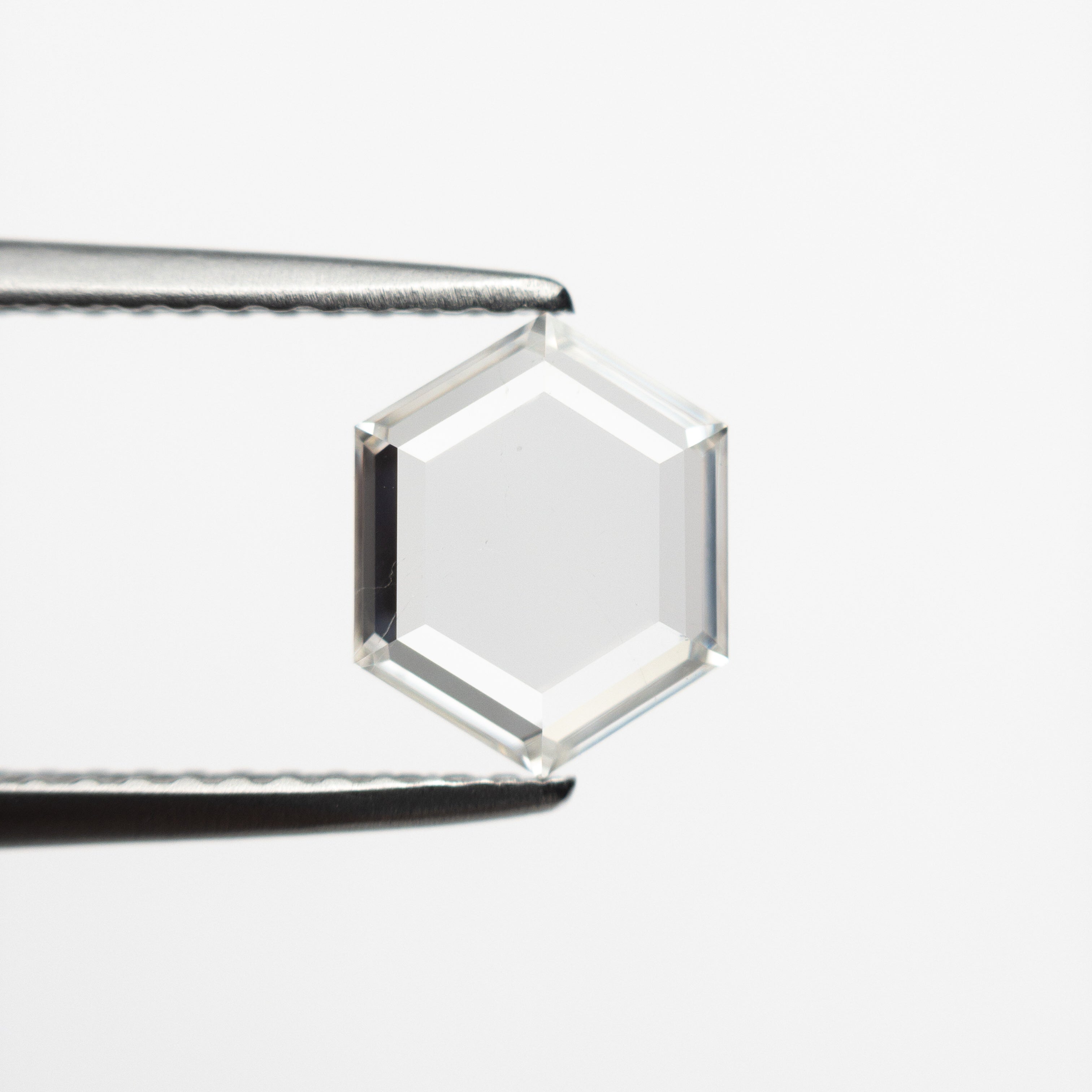 The 1.08ct 8.24x6.63x1.91mm SI2 G Hexagon Portrait Cut 19854-29 by East London jeweller Rachel Boston | Discover our collections of unique and timeless engagement rings, wedding rings, and modern fine jewellery.