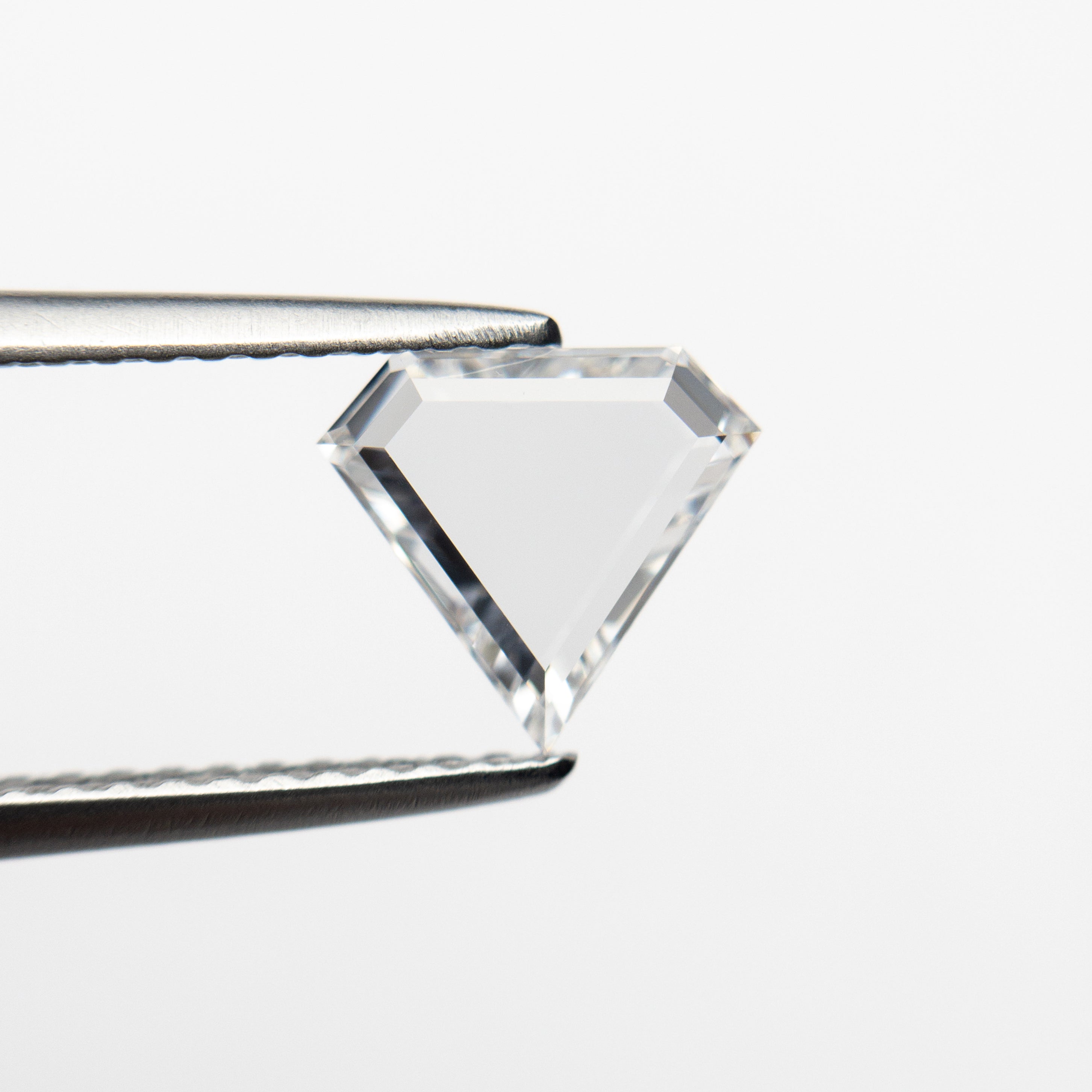 The 0.75ct 6.96x7.54x1.80mm VS1 E Shield Portrait Cut 19854-31 by East London jeweller Rachel Boston | Discover our collections of unique and timeless engagement rings, wedding rings, and modern fine jewellery.