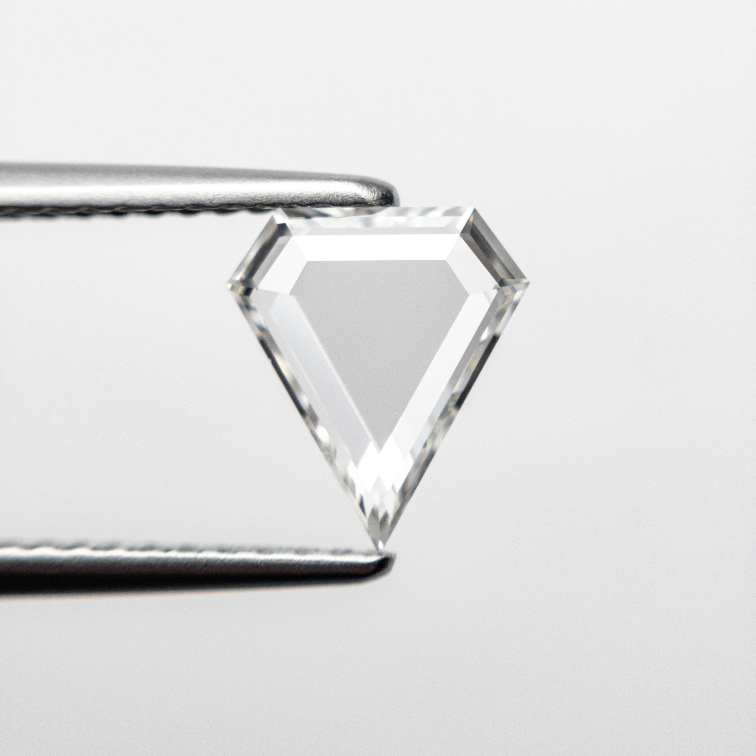 The 0.72ct 8.36x7.27x1.53mm VS2 F Shield Portrait Cut 19854-34 by East London jeweller Rachel Boston | Discover our collections of unique and timeless engagement rings, wedding rings, and modern fine jewellery.
