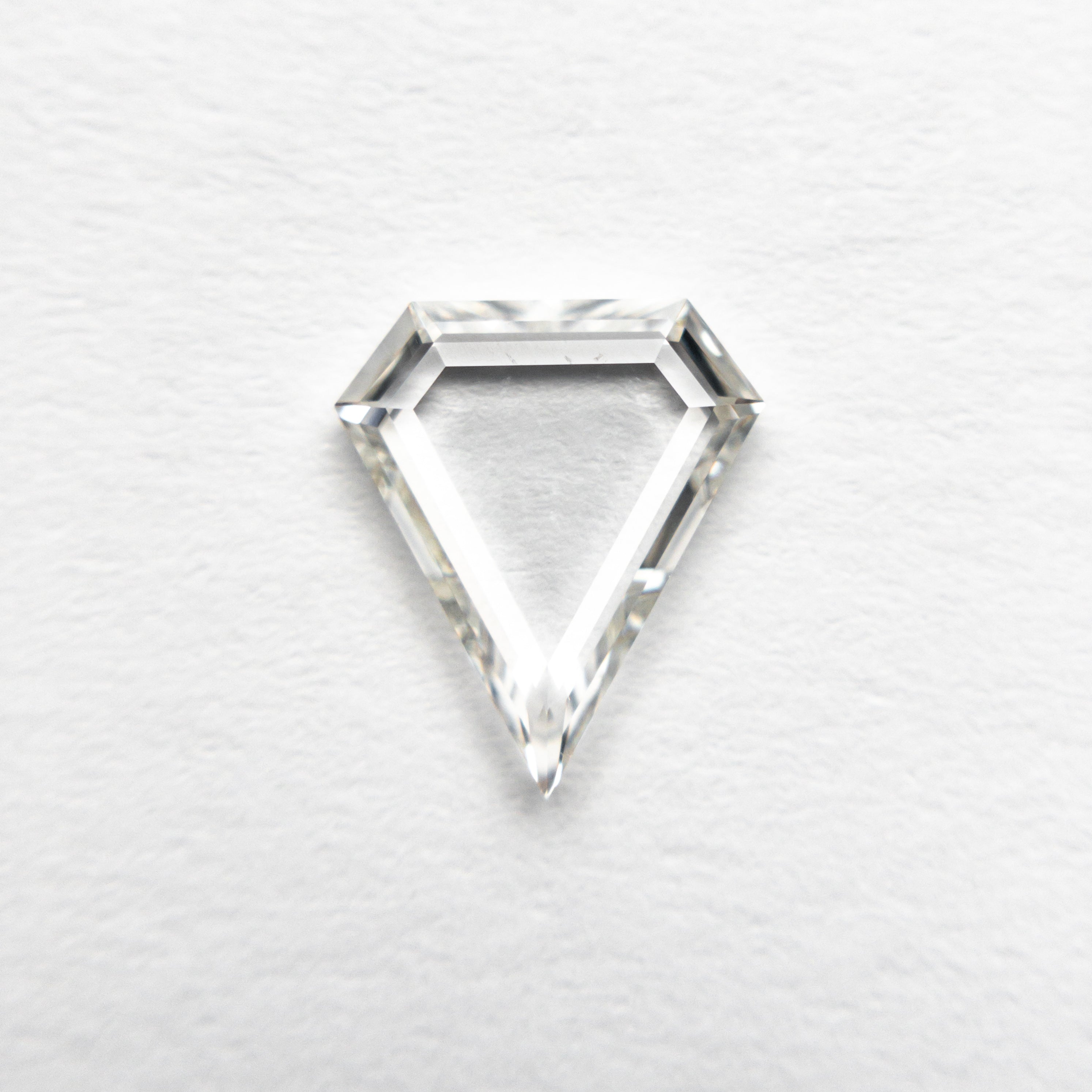 The 0.72ct 8.35x7.23x1.52mm SI1 H Shield Portrait Cut 19854-37 by East London jeweller Rachel Boston | Discover our collections of unique and timeless engagement rings, wedding rings, and modern fine jewellery.