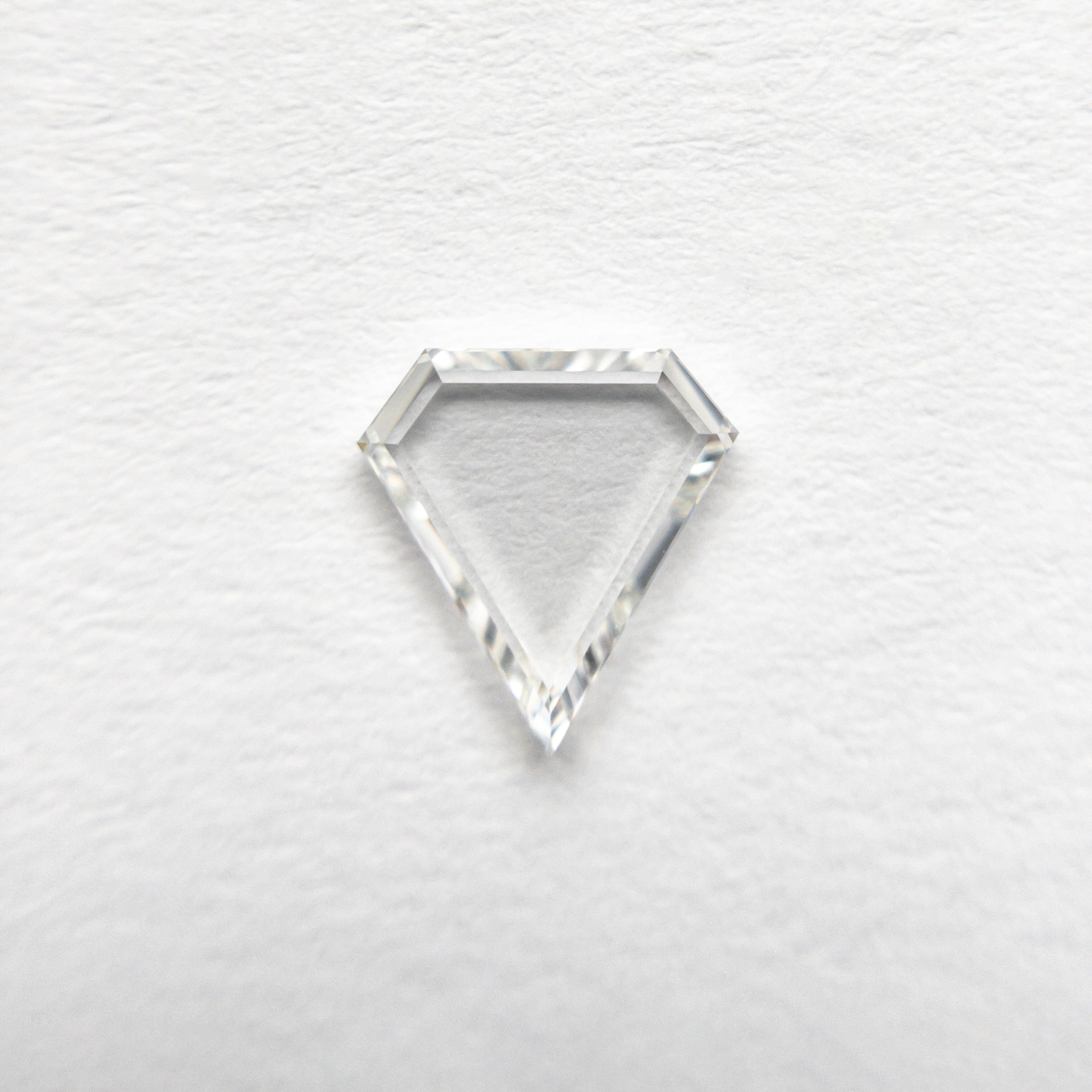 The 0.50ct 6.75x6.36x1.36mm VS2 G Shield Portrait Cut 19854-41 by East London jeweller Rachel Boston | Discover our collections of unique and timeless engagement rings, wedding rings, and modern fine jewellery.