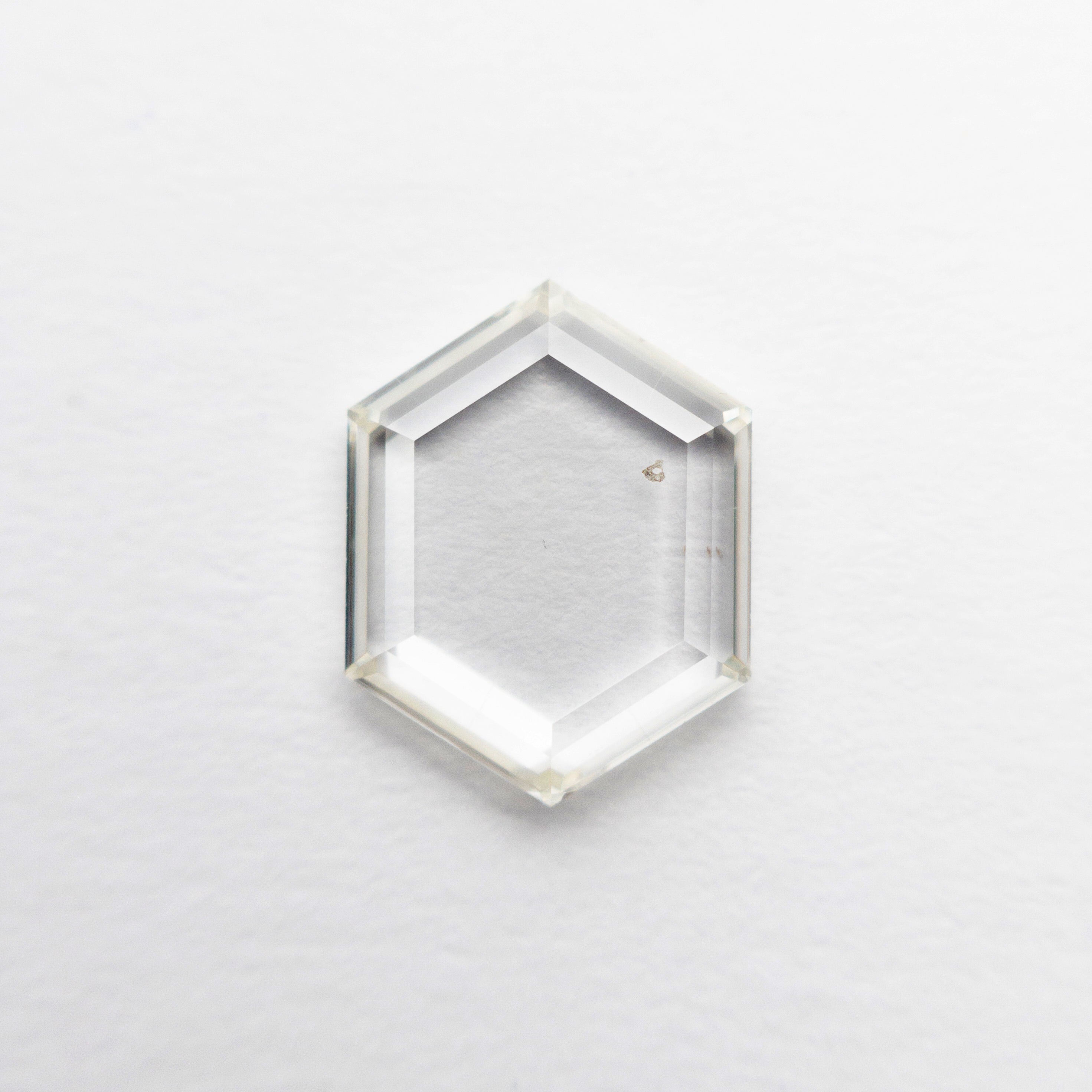 The 1.05ct 8.83x6.78x1.58mm SI2 I Hexagon Portrait Cut 19854-46 by East London jeweller Rachel Boston | Discover our collections of unique and timeless engagement rings, wedding rings, and modern fine jewellery.
