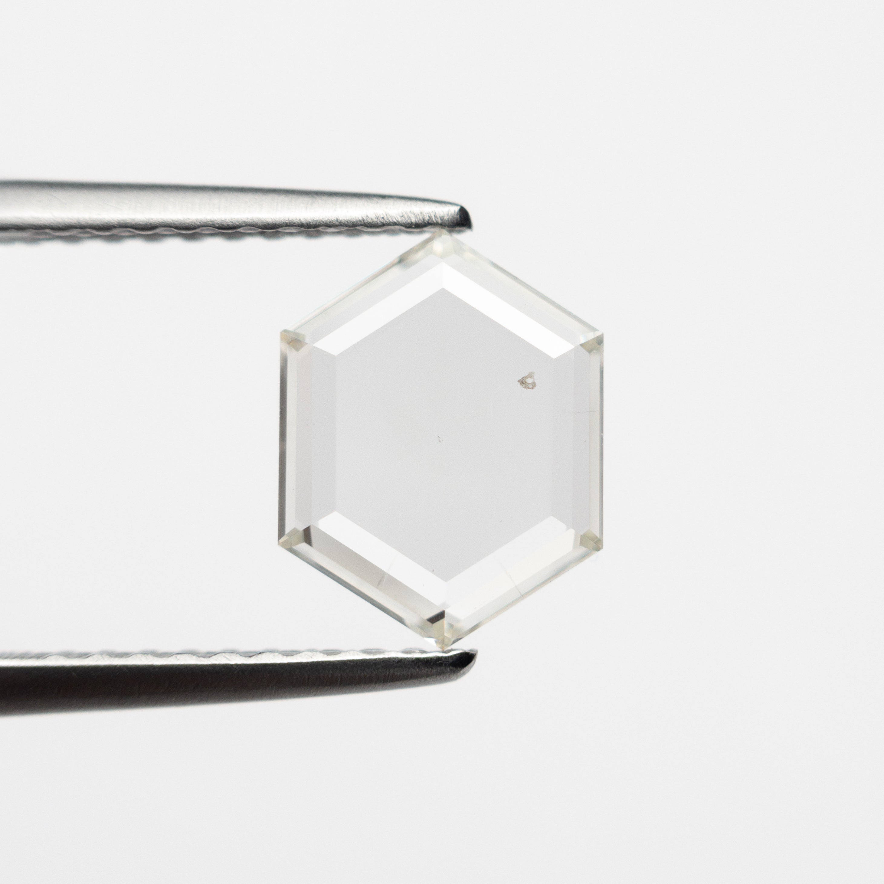 The 1.05ct 8.83x6.78x1.58mm SI2 I Hexagon Portrait Cut 19854-46 by East London jeweller Rachel Boston | Discover our collections of unique and timeless engagement rings, wedding rings, and modern fine jewellery.