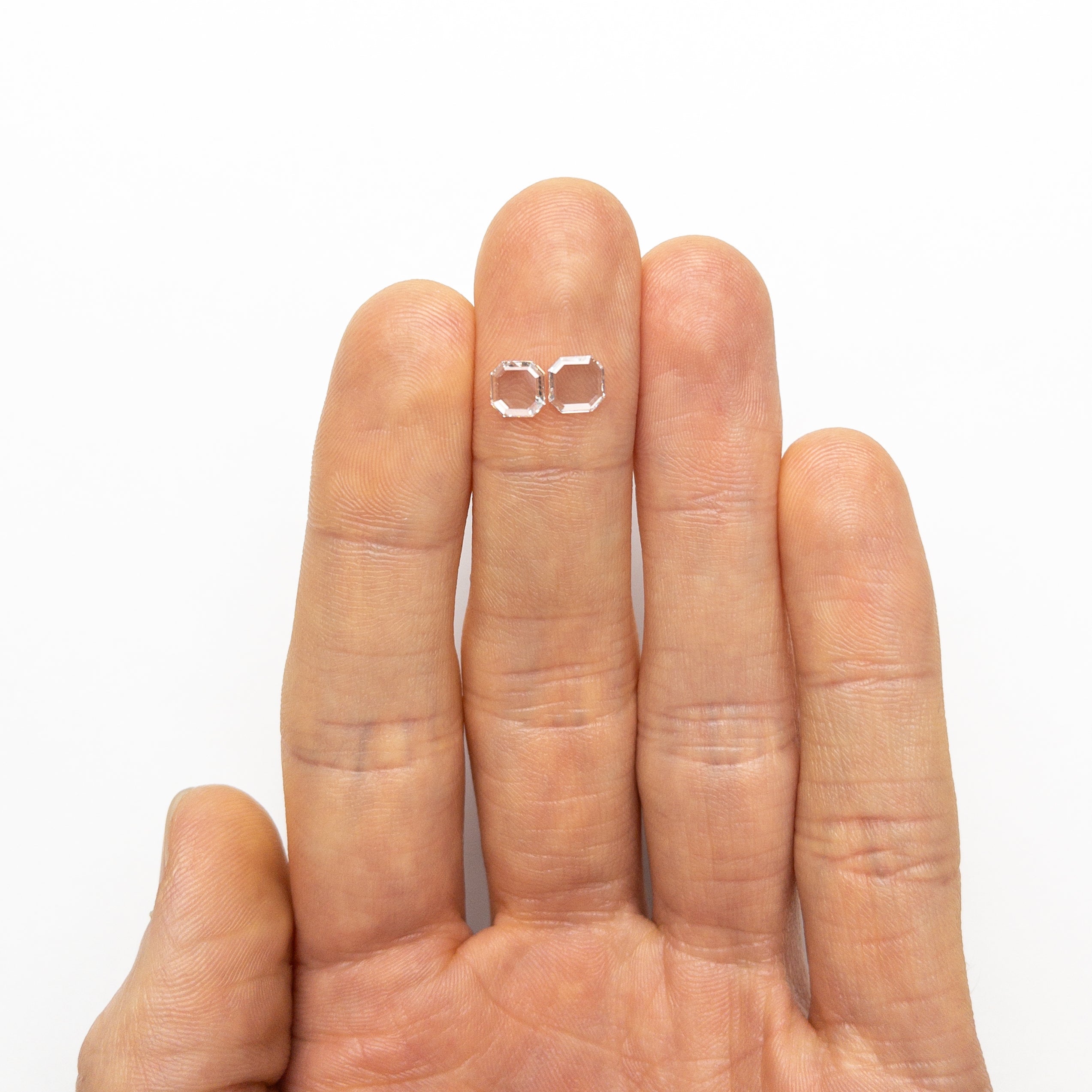 The 0.92cttw 2pc 5.61x5.60x1.24mm 5.63x5.61x1.00mm VS E/F Cut Corner Square Portrait Cut Matching Pair 19854-50 by East London jeweller Rachel Boston | Discover our collections of unique and timeless engagement rings, wedding rings, and modern fine jewellery.