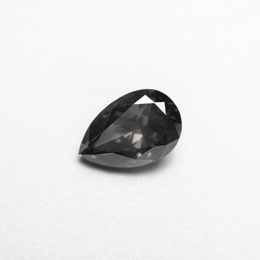 The 1.04ct 7.86x5.27x3.29mm Fancy Dark Grey Pear Brilliant 19913-17 by East London jeweller Rachel Boston | Discover our collections of unique and timeless engagement rings, wedding rings, and modern fine jewellery. - Rachel Boston Jewellery