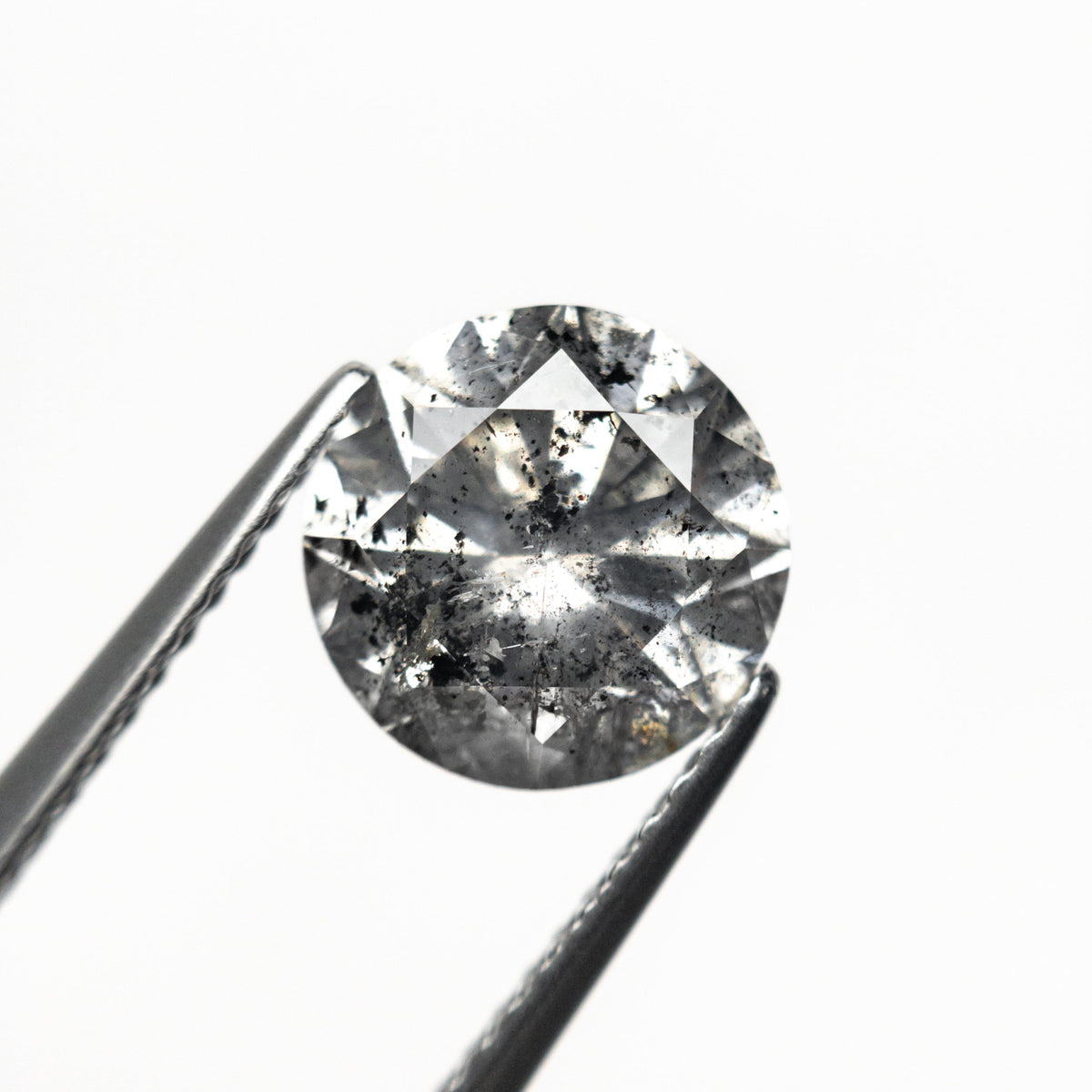 The 2.45ct 8.42x8.31x5.34mm Round Brilliant 19914-02 by East London jeweller Rachel Boston | Discover our collections of unique and timeless engagement rings, wedding rings, and modern fine jewellery.