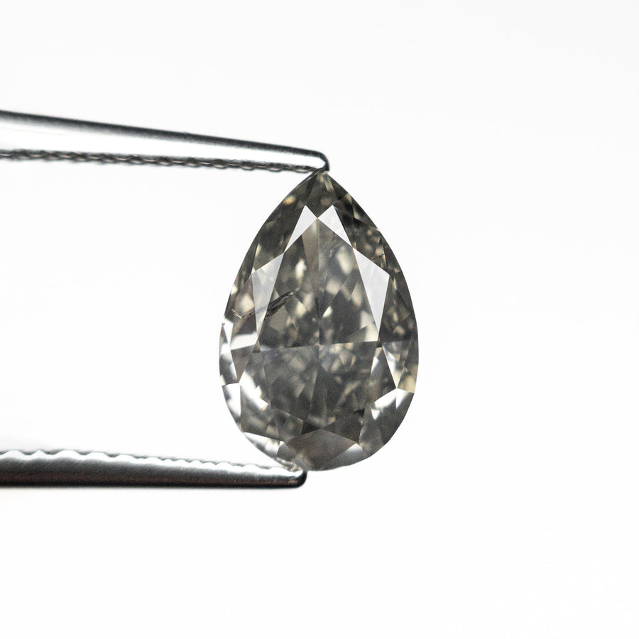The 1.60ct 9.31x6.12x3.80mm Fancy Grey Pear Brilliant 19916-01 by East London jeweller Rachel Boston | Discover our collections of unique and timeless engagement rings, wedding rings, and modern fine jewellery. - Rachel Boston Jewellery