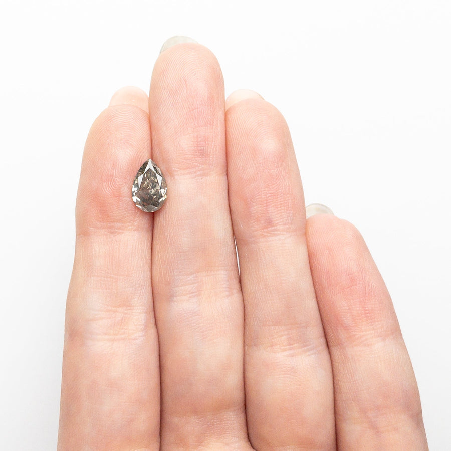 The 1.60ct 9.31x6.12x3.80mm Fancy Grey Pear Brilliant 19916-01 by East London jeweller Rachel Boston | Discover our collections of unique and timeless engagement rings, wedding rings, and modern fine jewellery. - Rachel Boston Jewellery