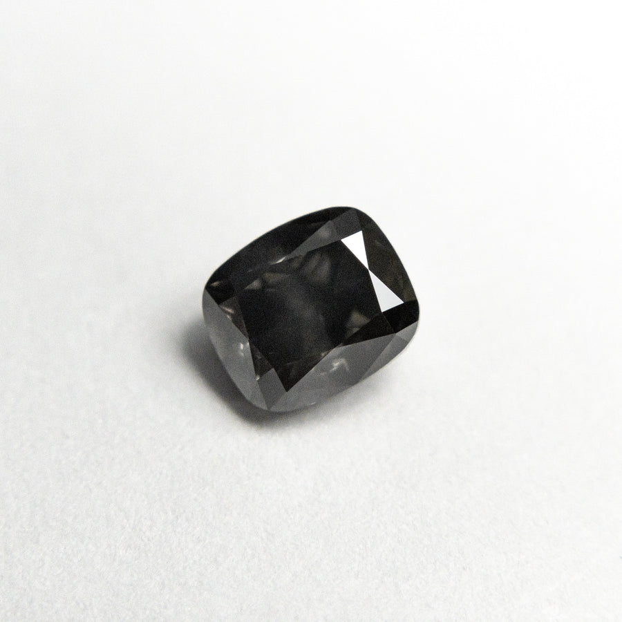 The 0.73ct 5.28x4.54x3.21mm SI2 Fancy Dark Grey Cushion Brilliant 19923-10 by East London jeweller Rachel Boston | Discover our collections of unique and timeless engagement rings, wedding rings, and modern fine jewellery. - Rachel Boston Jewellery