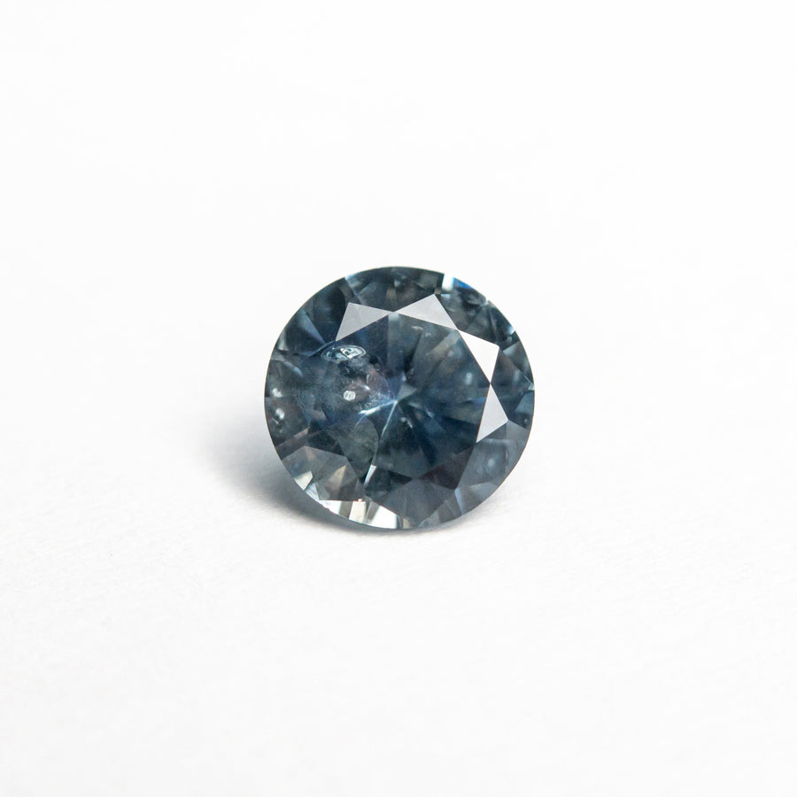 The 0.69ct 5.51x5.49x3.21mm Round Brilliant Sapphire 19942-36 by East London jeweller Rachel Boston | Discover our collections of unique and timeless engagement rings, wedding rings, and modern fine jewellery. - Rachel Boston Jewellery