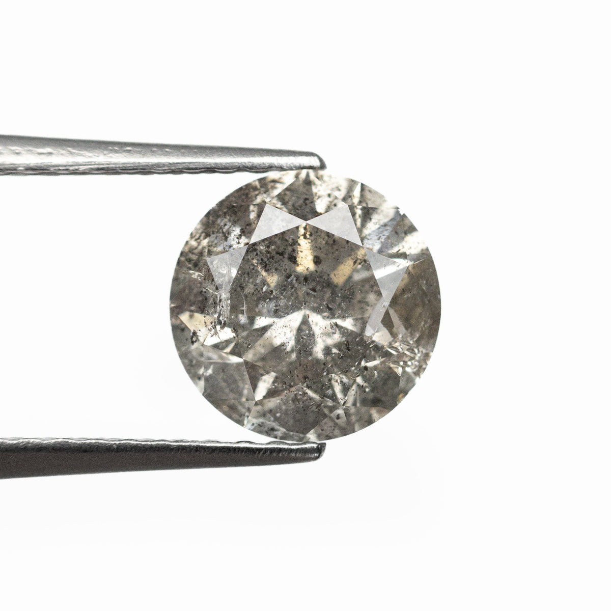 The 1.58ct 7.20x7.19x4.75mm Round Brilliant 20024-01 by East London jeweller Rachel Boston | Discover our collections of unique and timeless engagement rings, wedding rings, and modern fine jewellery.