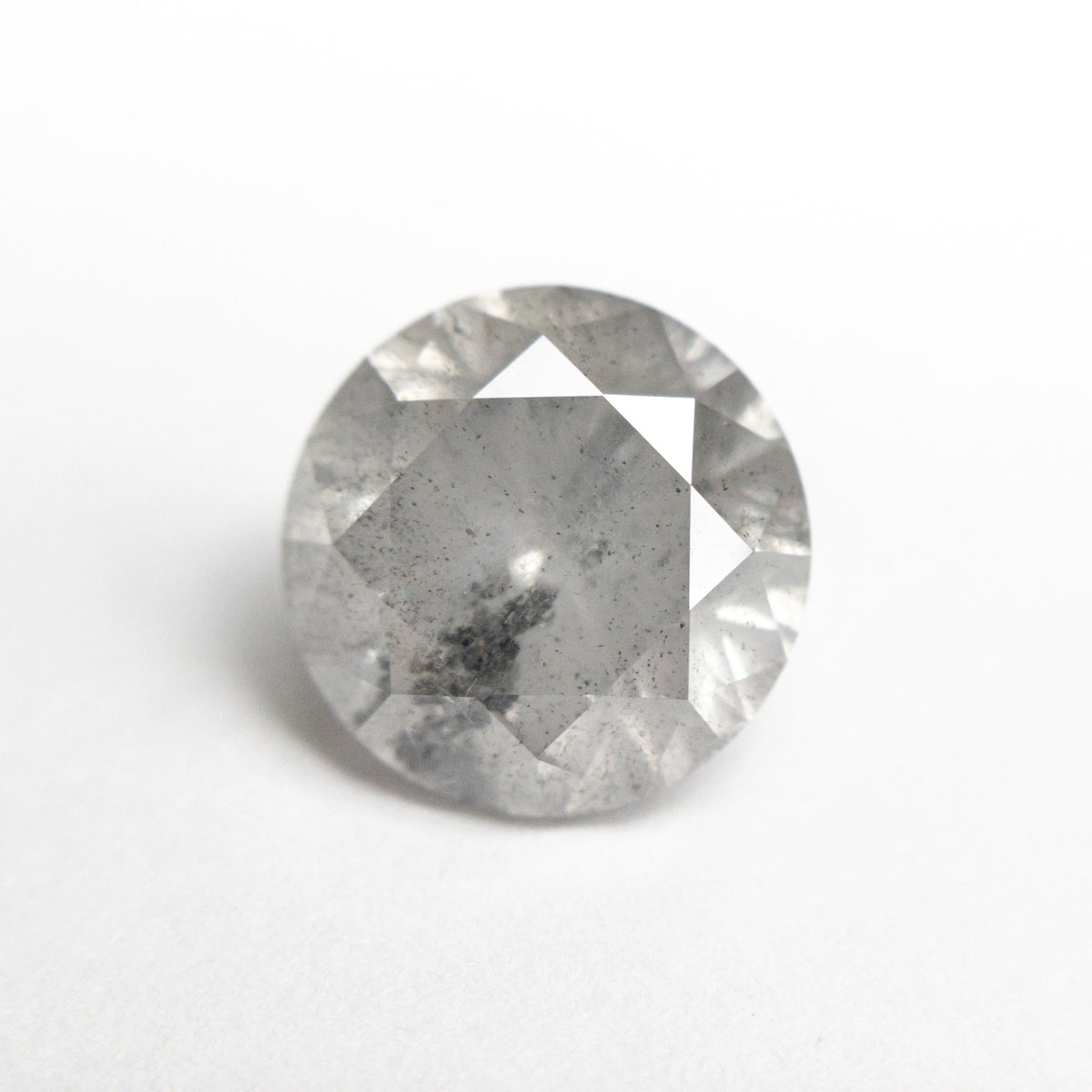 The 3.31ct 9.21x9.19x6.01mm Round Brilliant 20025-05 by East London jeweller Rachel Boston | Discover our collections of unique and timeless engagement rings, wedding rings, and modern fine jewellery.