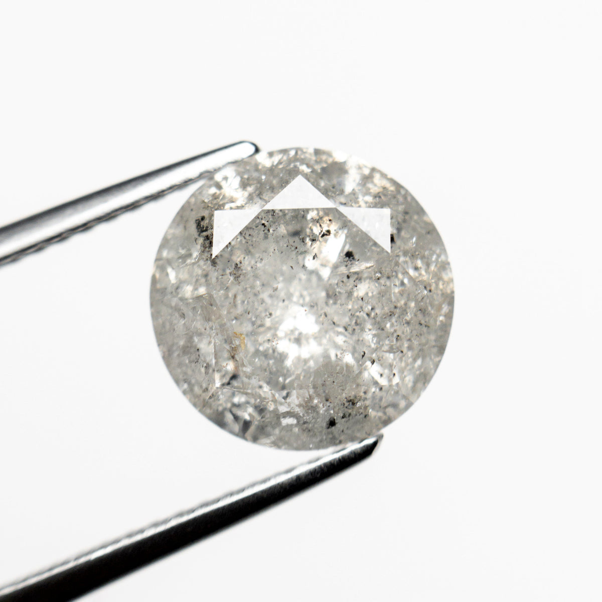 The 3.51ct 9.68x9.67x5.94mm Round Brilliant 20025-11 by East London jeweller Rachel Boston | Discover our collections of unique and timeless engagement rings, wedding rings, and modern fine jewellery.