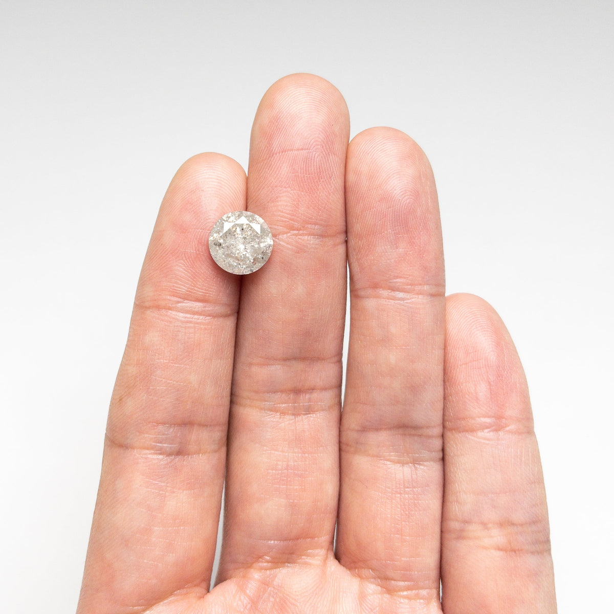 The 3.51ct 9.68x9.67x5.94mm Round Brilliant 20025-11 by East London jeweller Rachel Boston | Discover our collections of unique and timeless engagement rings, wedding rings, and modern fine jewellery.