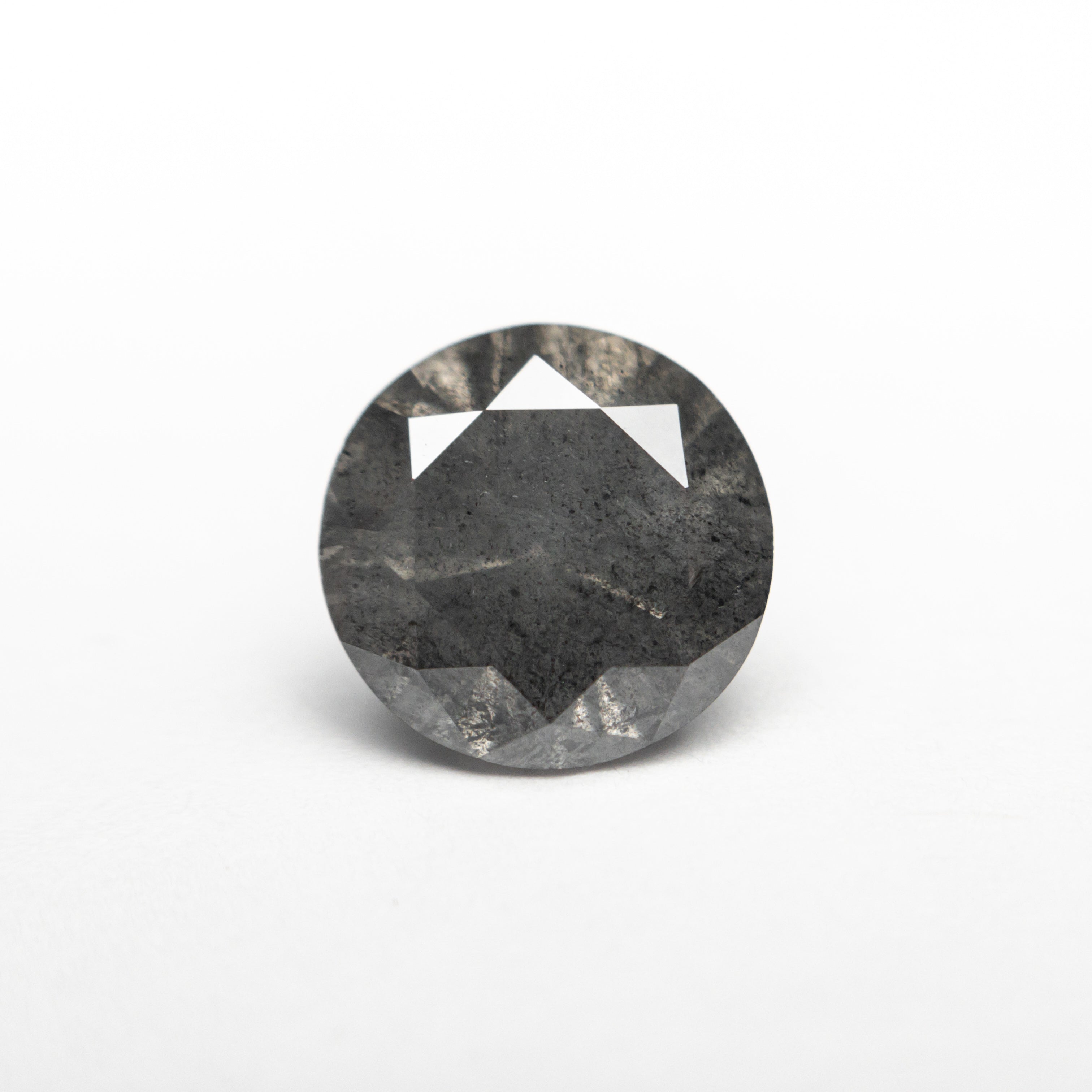 The 1.84ct 7.90x7.83x5.02mm Round Brilliant 20025-15 by East London jeweller Rachel Boston | Discover our collections of unique and timeless engagement rings, wedding rings, and modern fine jewellery.