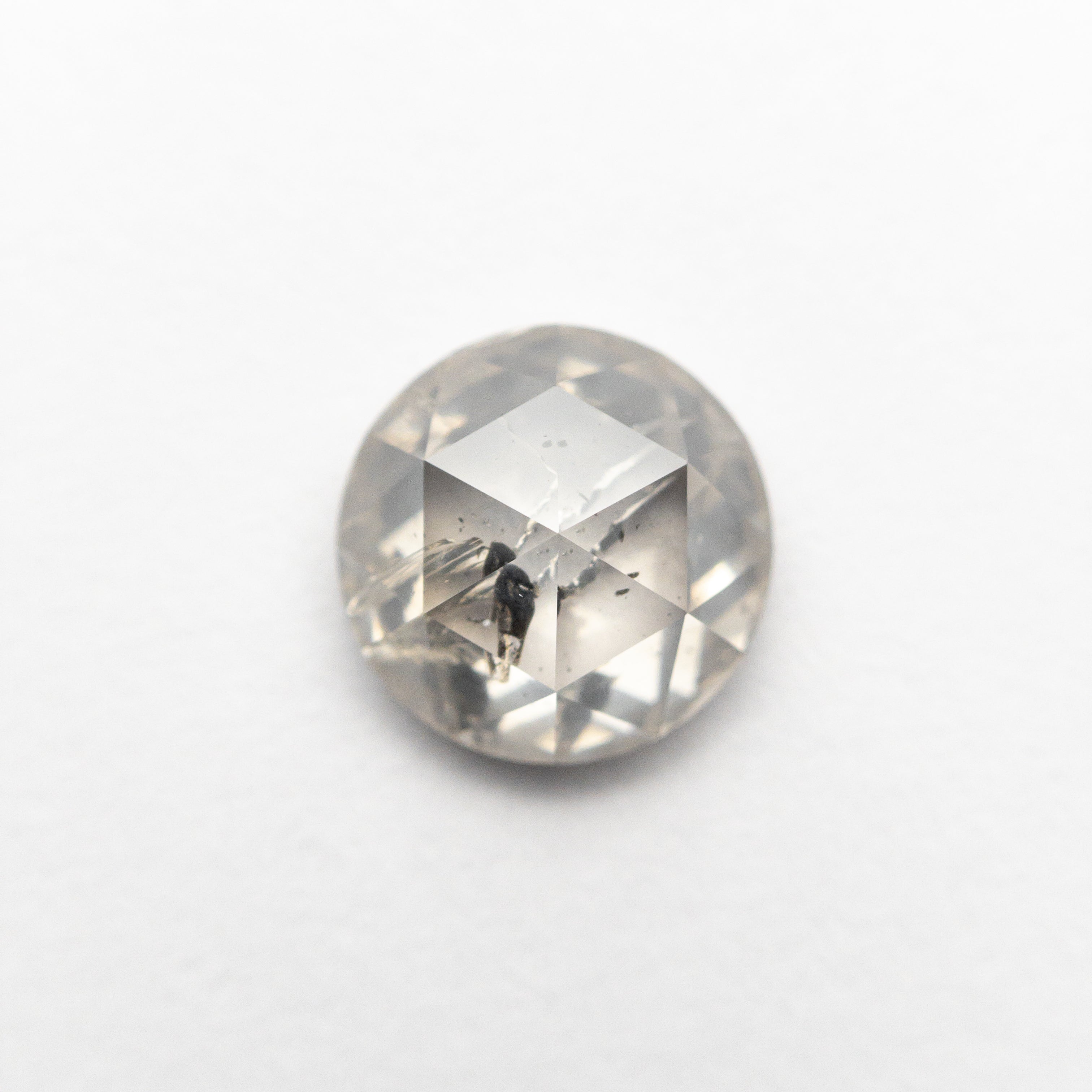 The 1.30ct 6.74x6.68x3.35mm Round Rosecut 20026-09 by East London jeweller Rachel Boston | Discover our collections of unique and timeless engagement rings, wedding rings, and modern fine jewellery.