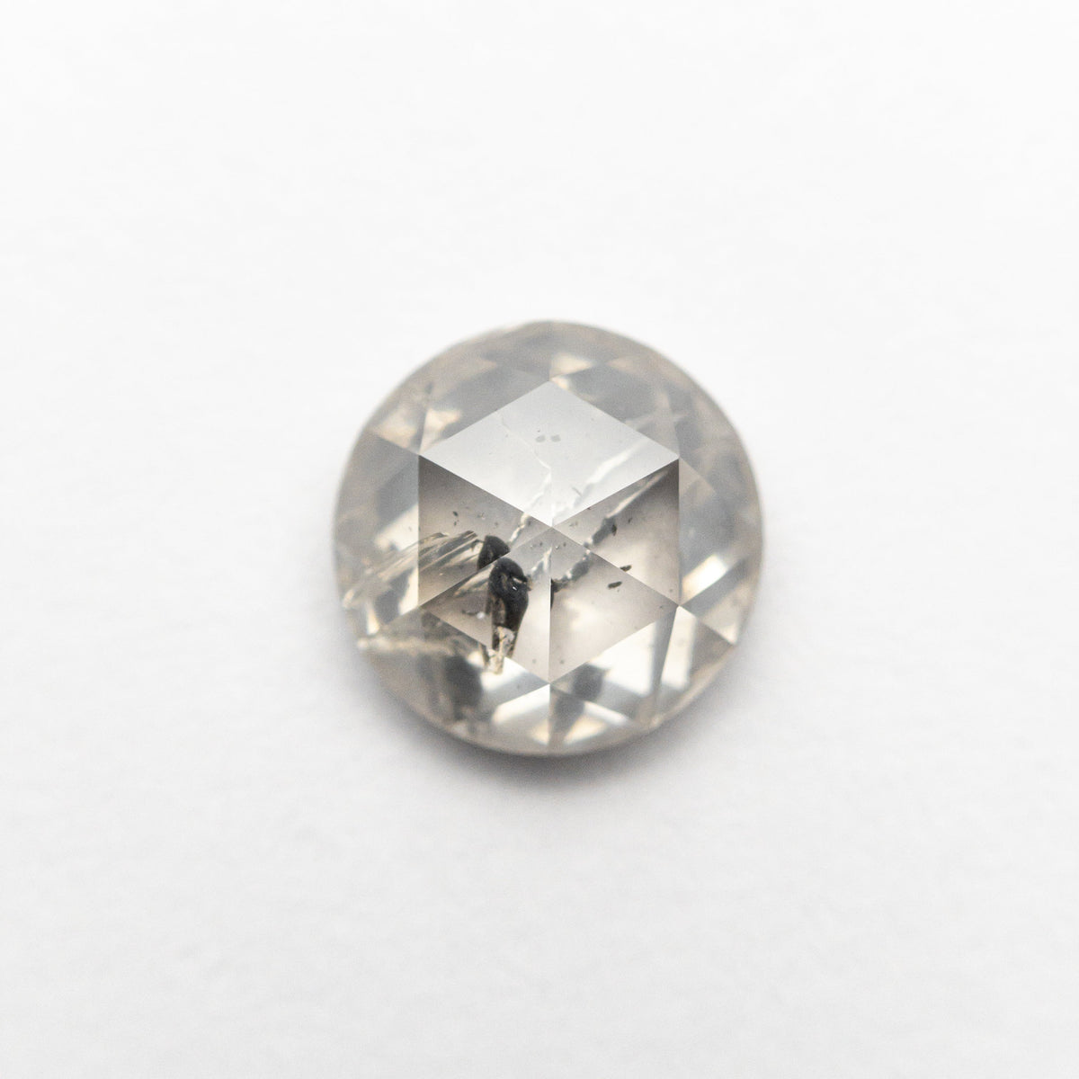 The 1.30ct 6.74x6.68x3.35mm Round Rosecut 20026-09 by East London jeweller Rachel Boston | Discover our collections of unique and timeless engagement rings, wedding rings, and modern fine jewellery.