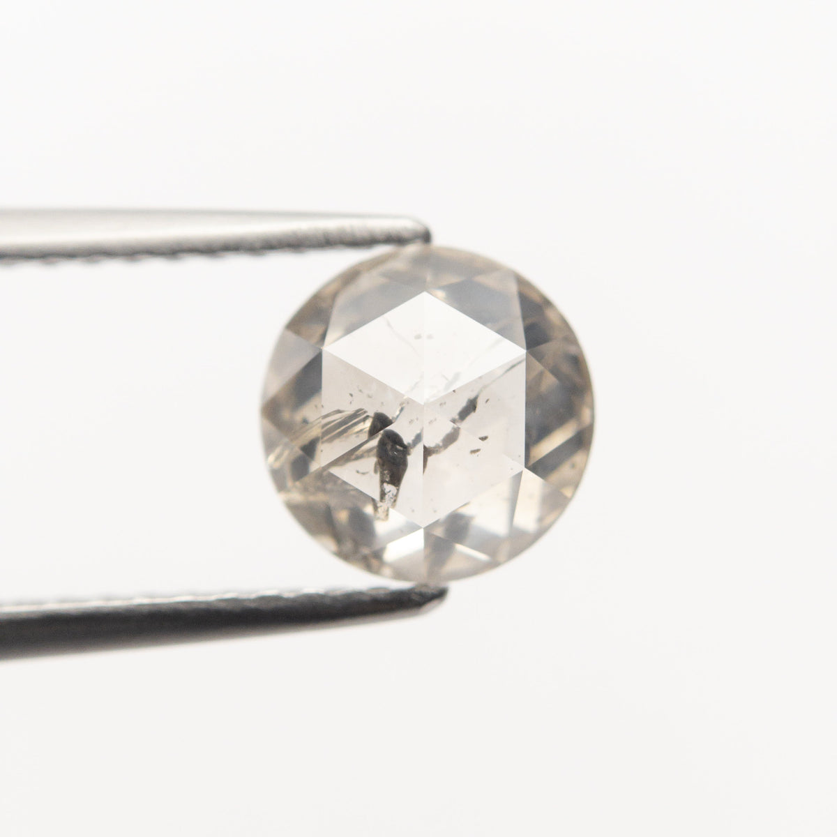 The 1.30ct 6.74x6.68x3.35mm Round Rosecut 20026-09 by East London jeweller Rachel Boston | Discover our collections of unique and timeless engagement rings, wedding rings, and modern fine jewellery.