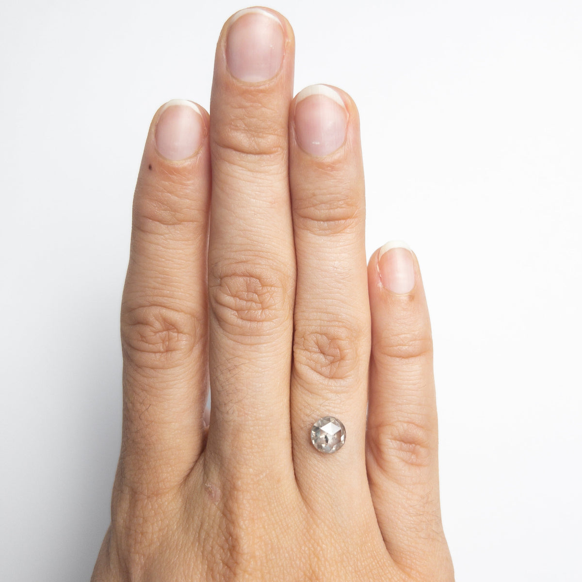 The 1.30ct 6.74x6.68x3.35mm Round Rosecut 20026-09 by East London jeweller Rachel Boston | Discover our collections of unique and timeless engagement rings, wedding rings, and modern fine jewellery.