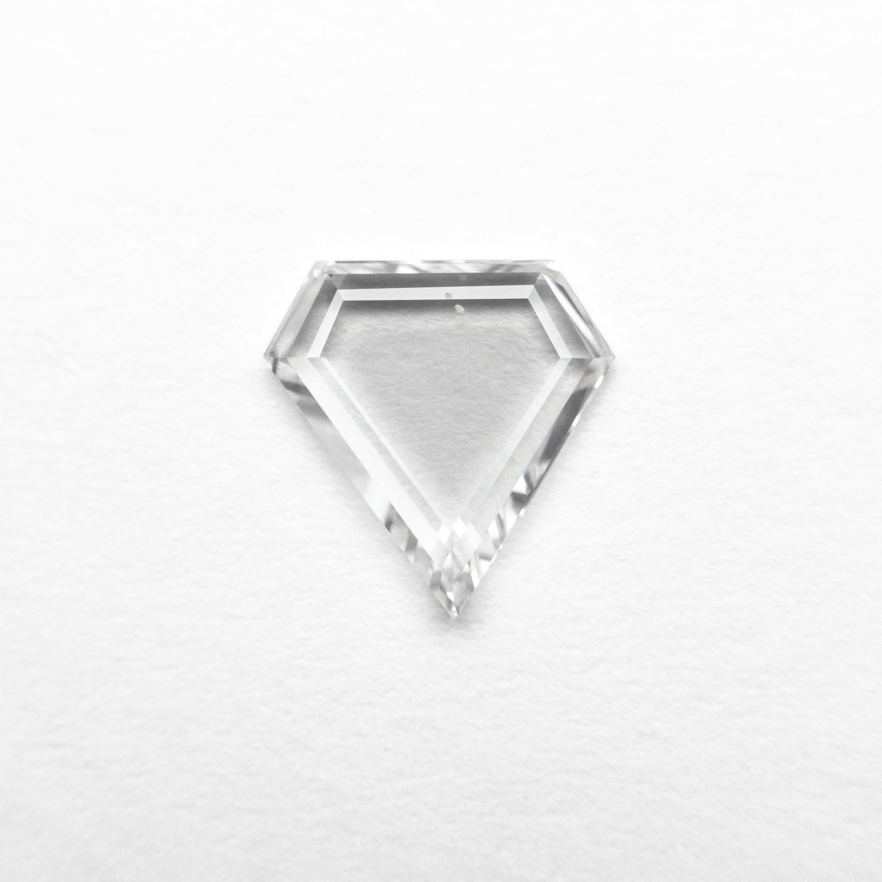 The 0.49ct 6.60x6.46x1.44mm Shield Portrait Cut 20027-11 by East London jeweller Rachel Boston | Discover our collections of unique and timeless engagement rings, wedding rings, and modern fine jewellery.
