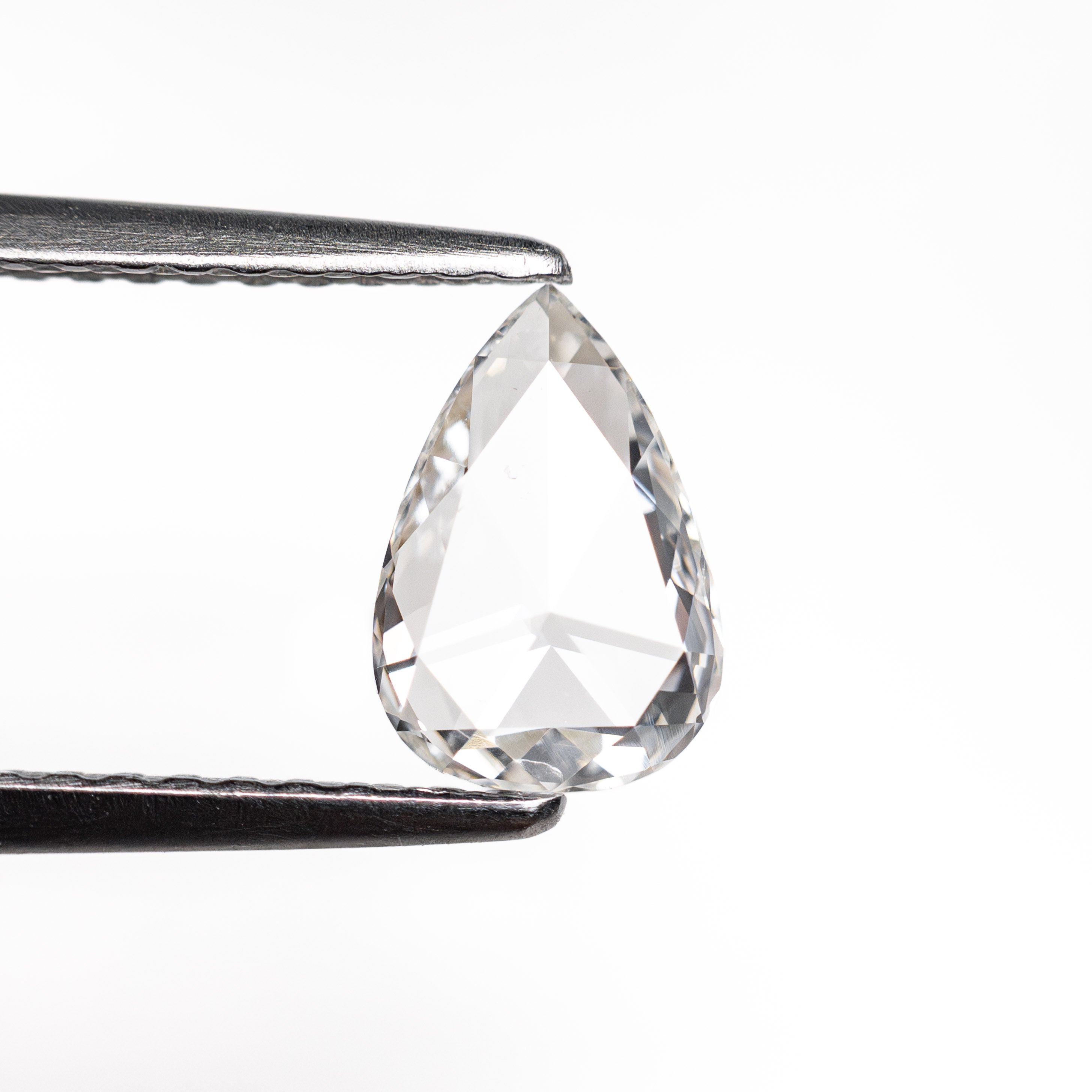 The 0.59ct 7.62x5.19x1.78mm SI2 G Pear Rosecut 20027-21 by East London jeweller Rachel Boston | Discover our collections of unique and timeless engagement rings, wedding rings, and modern fine jewellery.