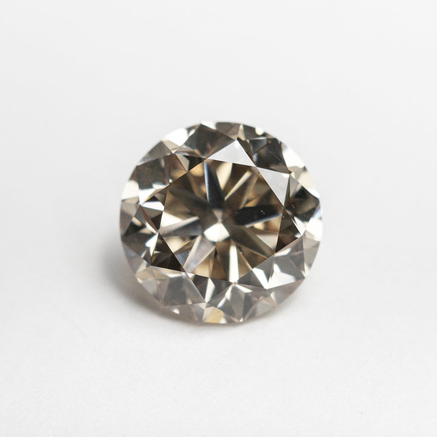 The 3.00ct 8.92x8.91x5.75mm VS2 Champagne Round Brilliant 20231-01 by East London jeweller Rachel Boston | Discover our collections of unique and timeless engagement rings, wedding rings, and modern fine jewellery. - Rachel Boston Jewellery