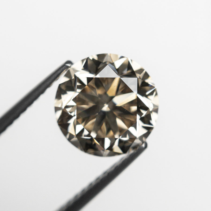 The 3.00ct 8.92x8.91x5.75mm VS2 Champagne Round Brilliant 20231-01 by East London jeweller Rachel Boston | Discover our collections of unique and timeless engagement rings, wedding rings, and modern fine jewellery. - Rachel Boston Jewellery