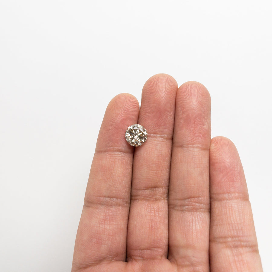 The 3.00ct 8.92x8.91x5.75mm VS2 Champagne Round Brilliant 20231-01 by East London jeweller Rachel Boston | Discover our collections of unique and timeless engagement rings, wedding rings, and modern fine jewellery. - Rachel Boston Jewellery
