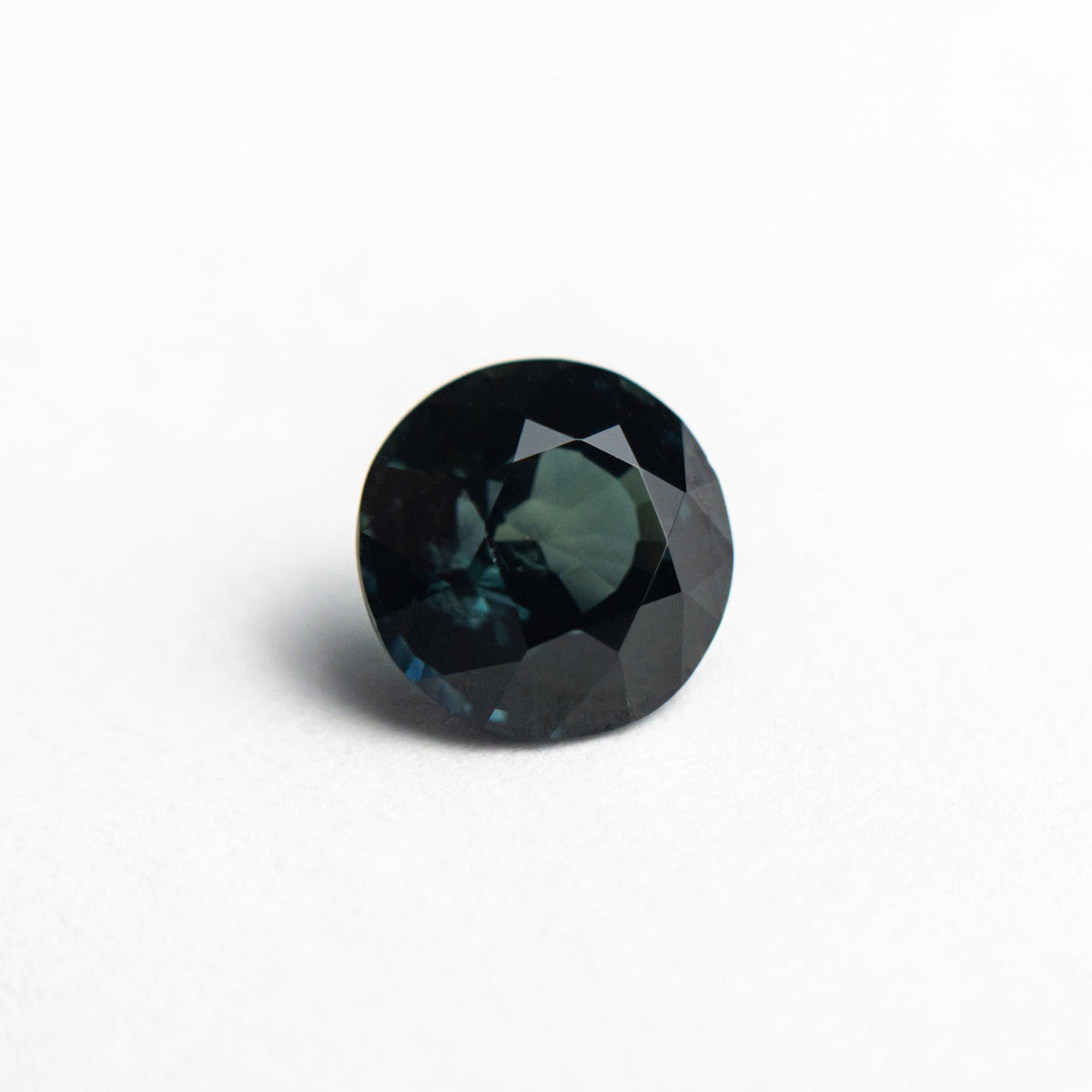 The 1.39ct 6.45x6.42x4.21mm Round Brilliant Sapphire 20674-09 by East London jeweller Rachel Boston | Discover our collections of unique and timeless engagement rings, wedding rings, and modern fine jewellery.