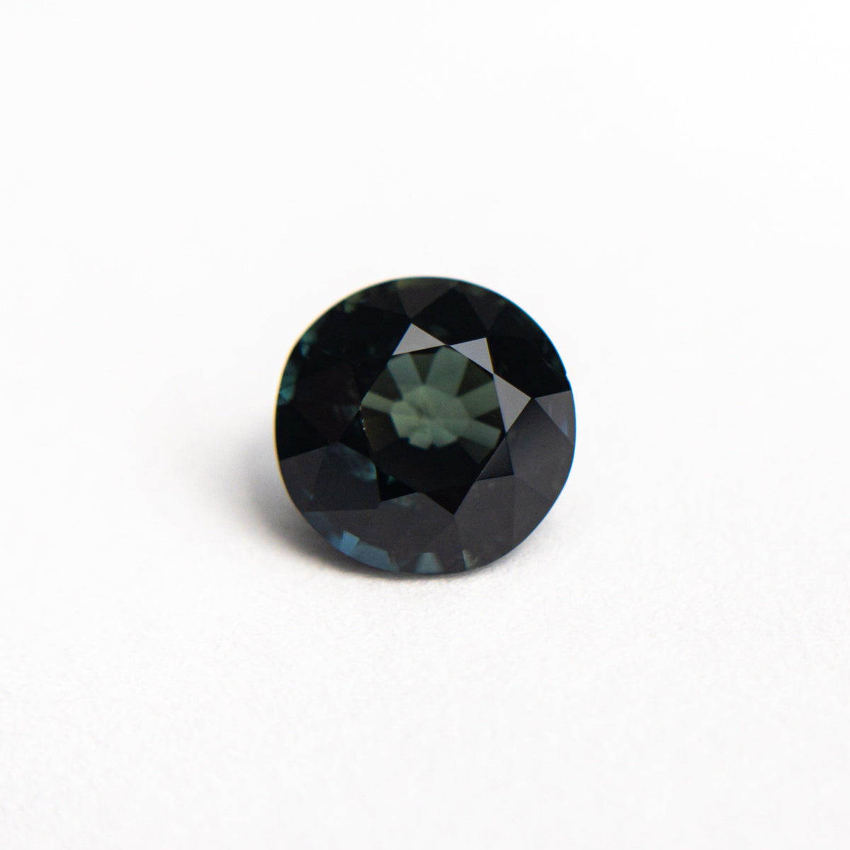 The 1.39ct 6.45x6.42x4.21mm Round Brilliant Sapphire 20674-09 by East London jeweller Rachel Boston | Discover our collections of unique and timeless engagement rings, wedding rings, and modern fine jewellery.