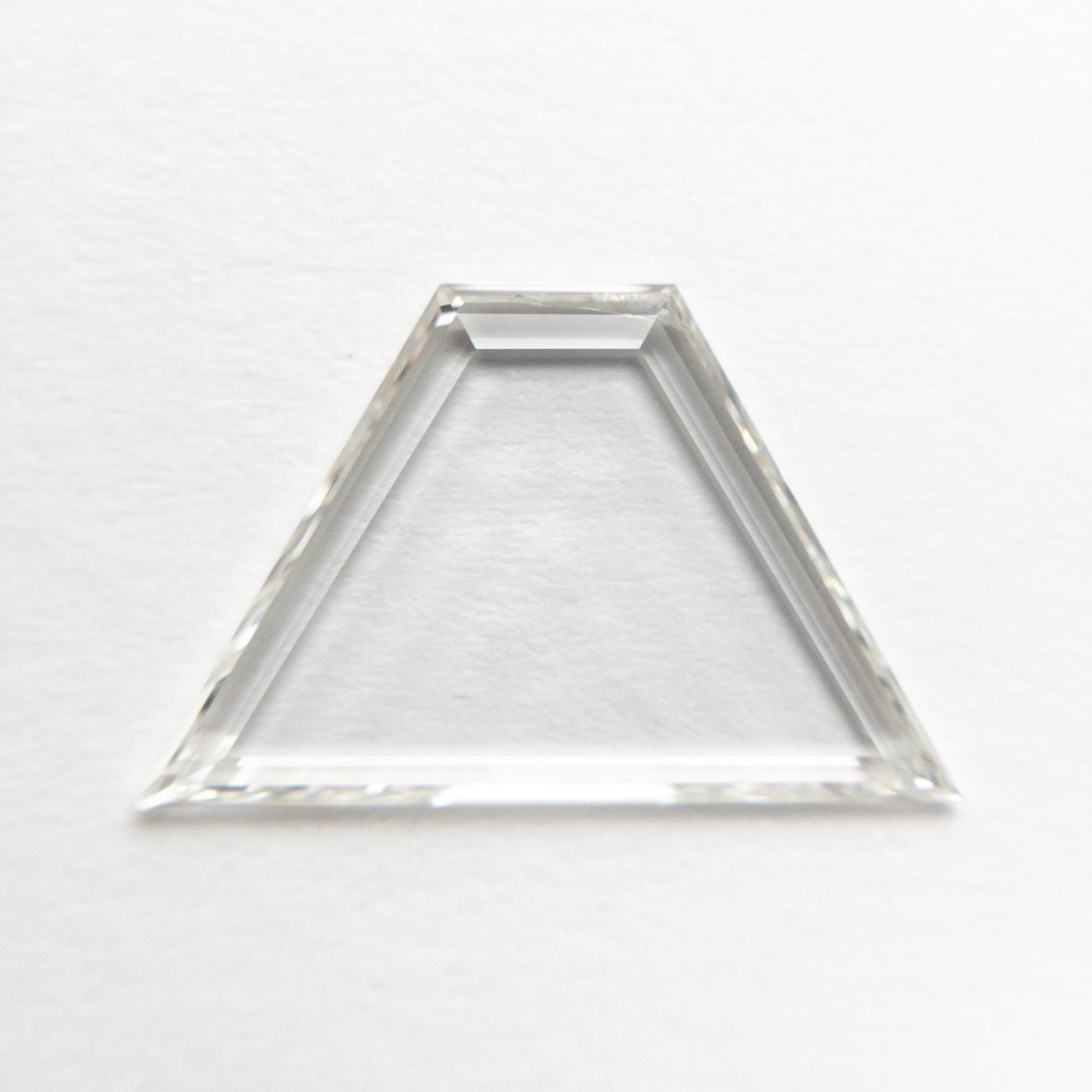 The 1.42ct 8.61x13.76x1.37mm SI1 I Trapezoid Portrait Cut 20745-02 by East London jeweller Rachel Boston | Discover our collections of unique and timeless engagement rings, wedding rings, and modern fine jewellery.