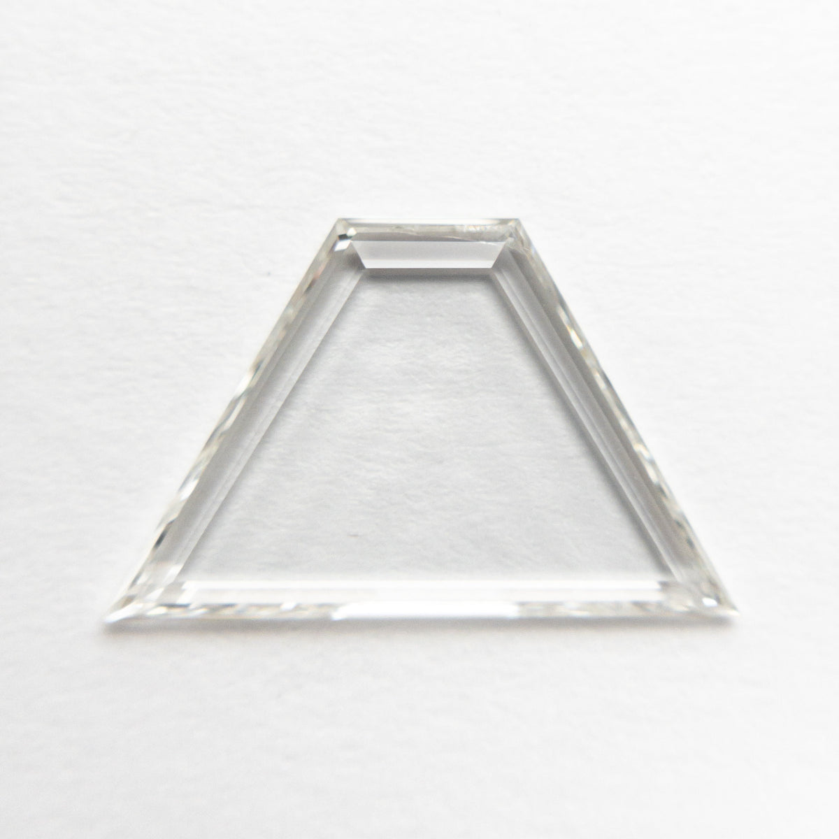 The 1.42ct 8.61x13.76x1.37mm SI1 I Trapezoid Portrait Cut 20745-02 by East London jeweller Rachel Boston | Discover our collections of unique and timeless engagement rings, wedding rings, and modern fine jewellery.