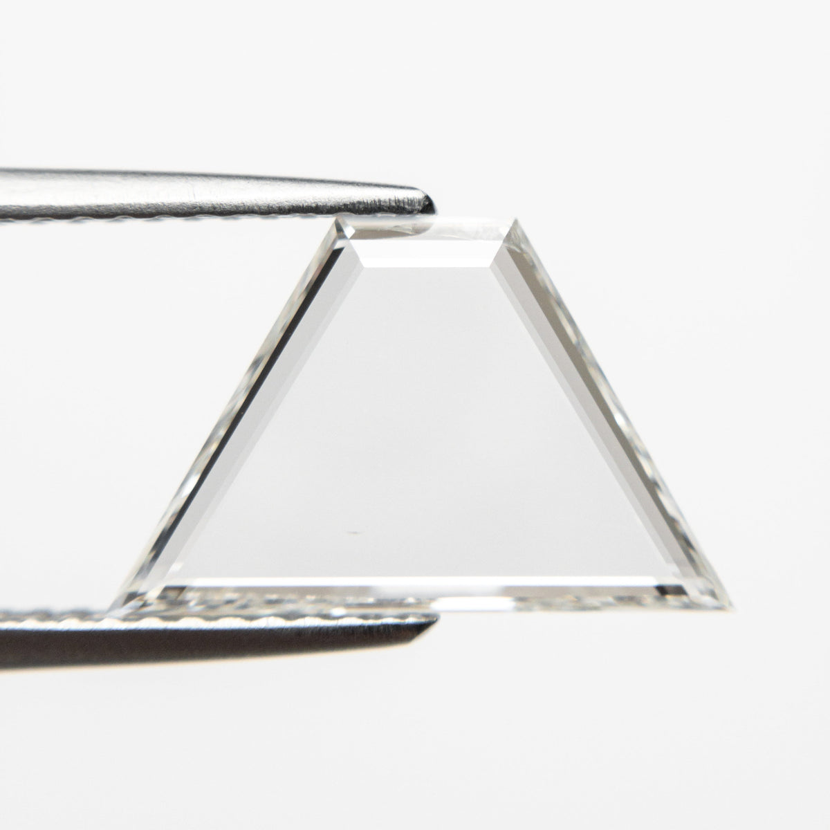 The 1.42ct 8.61x13.76x1.37mm SI1 I Trapezoid Portrait Cut 20745-02 by East London jeweller Rachel Boston | Discover our collections of unique and timeless engagement rings, wedding rings, and modern fine jewellery.