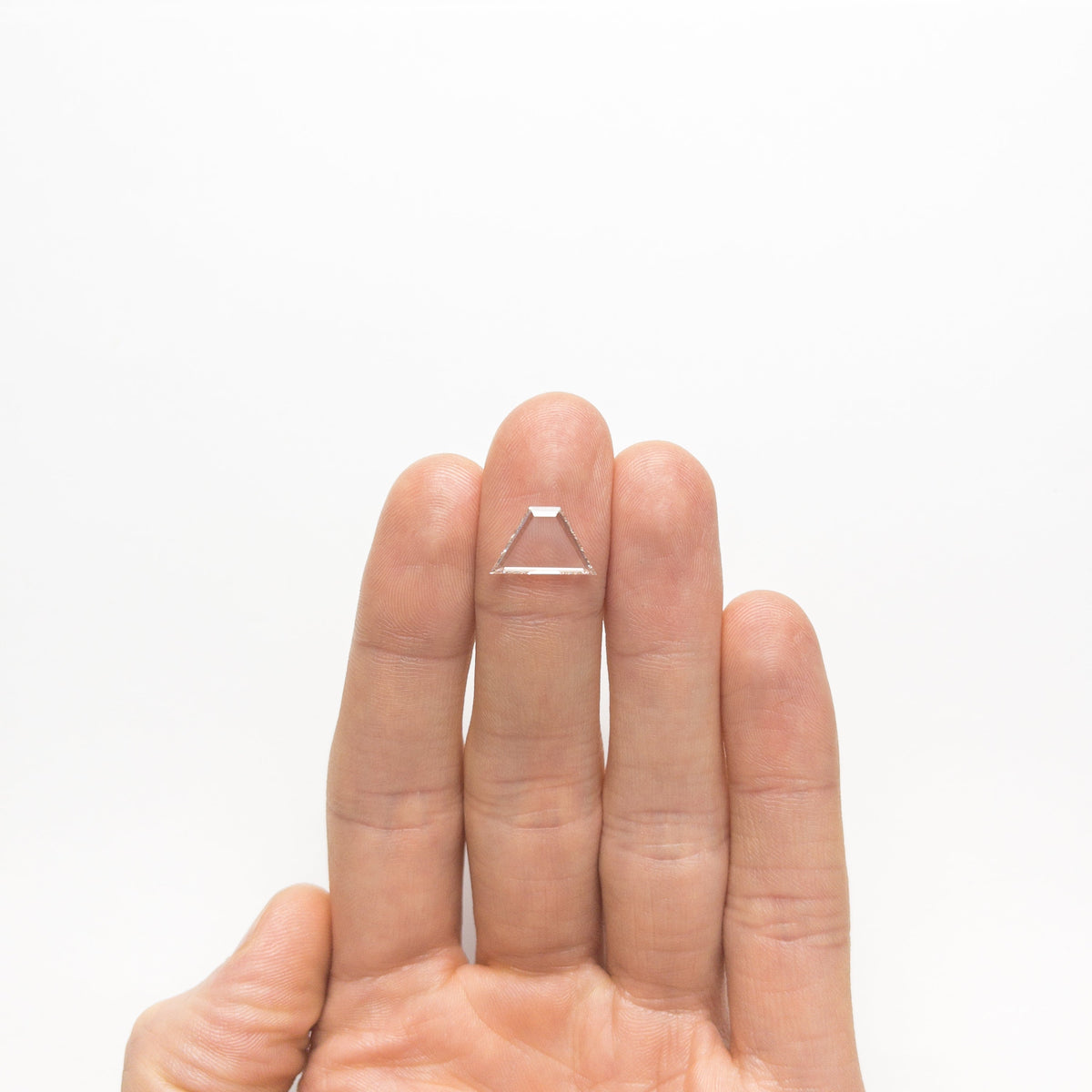 The 1.42ct 8.61x13.76x1.37mm SI1 I Trapezoid Portrait Cut 20745-02 by East London jeweller Rachel Boston | Discover our collections of unique and timeless engagement rings, wedding rings, and modern fine jewellery.
