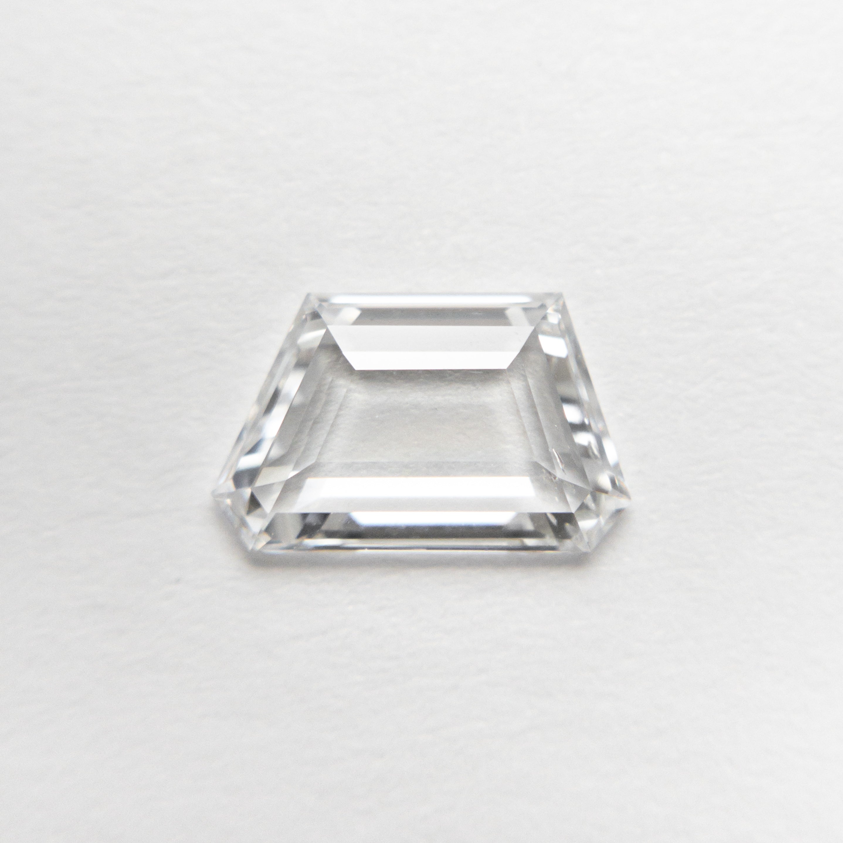 The 0.79ct 5.32x8.60x1.59mm SI2 D Geometric Portrait Cut 20745-04 by East London jeweller Rachel Boston | Discover our collections of unique and timeless engagement rings, wedding rings, and modern fine jewellery.