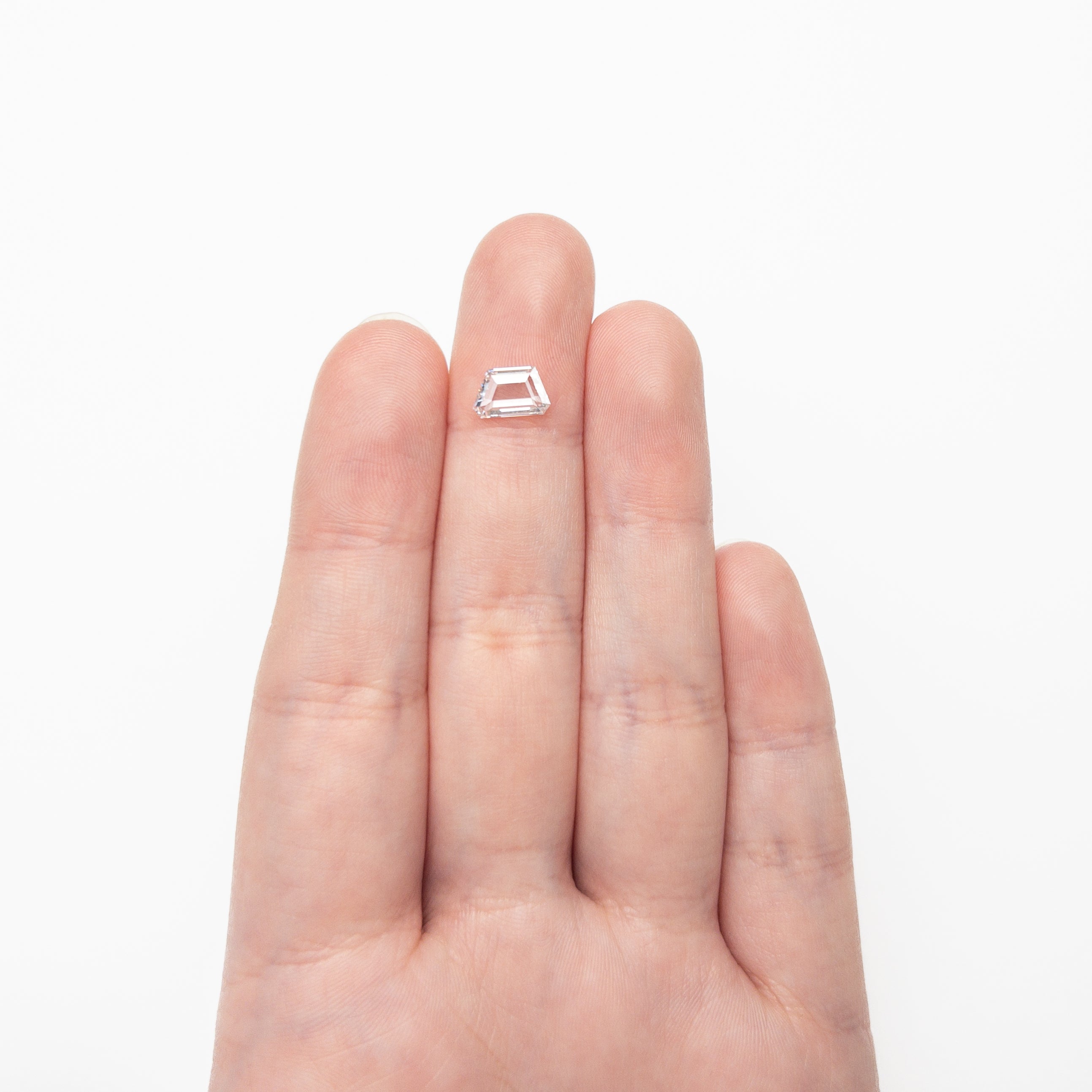 The 0.79ct 5.32x8.60x1.59mm SI2 D Geometric Portrait Cut 20745-04 by East London jeweller Rachel Boston | Discover our collections of unique and timeless engagement rings, wedding rings, and modern fine jewellery.