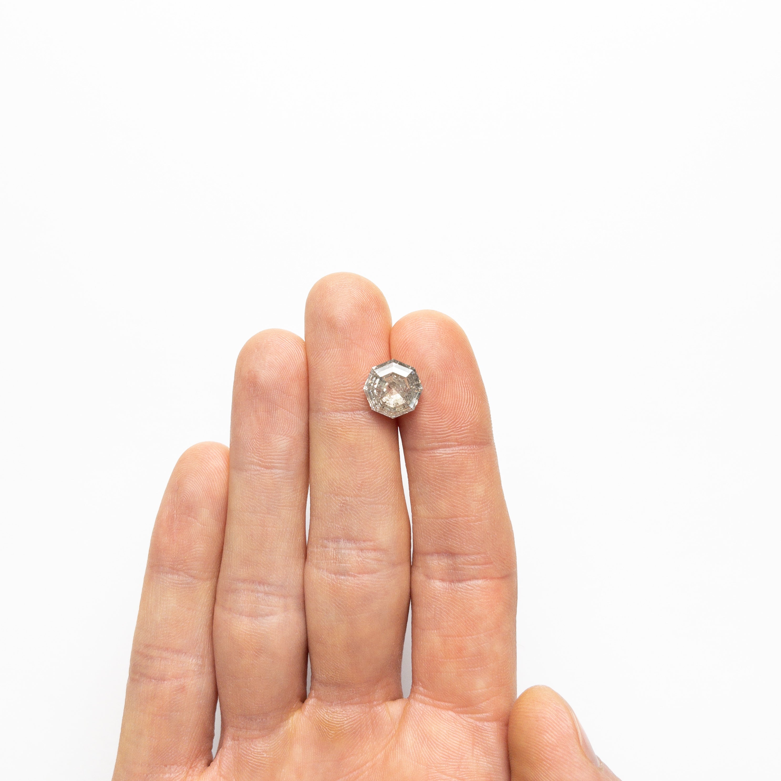 The 5.57ct 11.08x10.30x6.19mm Octagon Double Cut 20921-01 by East London jeweller Rachel Boston | Discover our collections of unique and timeless engagement rings, wedding rings, and modern fine jewellery.