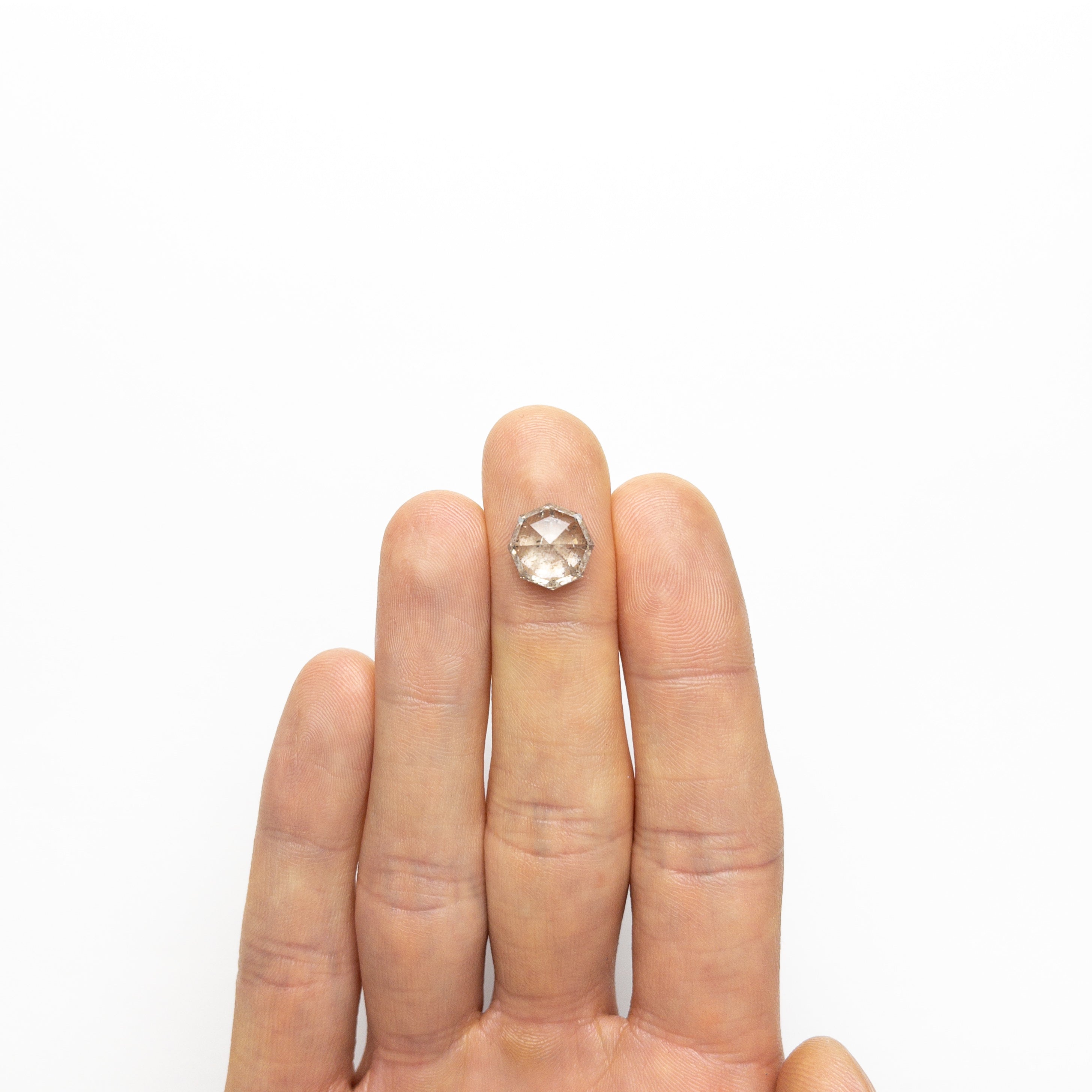 The 5.57ct 11.08x10.30x6.19mm Octagon Double Cut 20921-01 by East London jeweller Rachel Boston | Discover our collections of unique and timeless engagement rings, wedding rings, and modern fine jewellery.