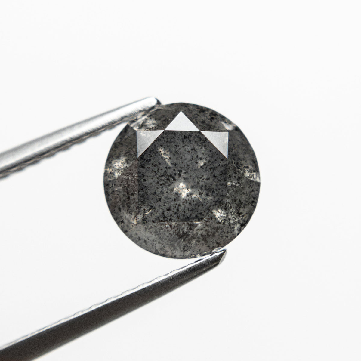 The 2.12ct 7.89x7.85x5.13mm Round Brilliant 20931-01 by East London jeweller Rachel Boston | Discover our collections of unique and timeless engagement rings, wedding rings, and modern fine jewellery.