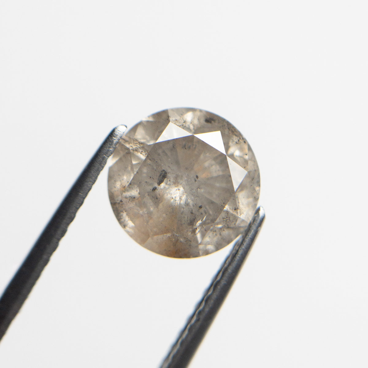 The 2.23ct 7.84x7.75x5.31mm Round Brilliant 20931-04 by East London jeweller Rachel Boston | Discover our collections of unique and timeless engagement rings, wedding rings, and modern fine jewellery.