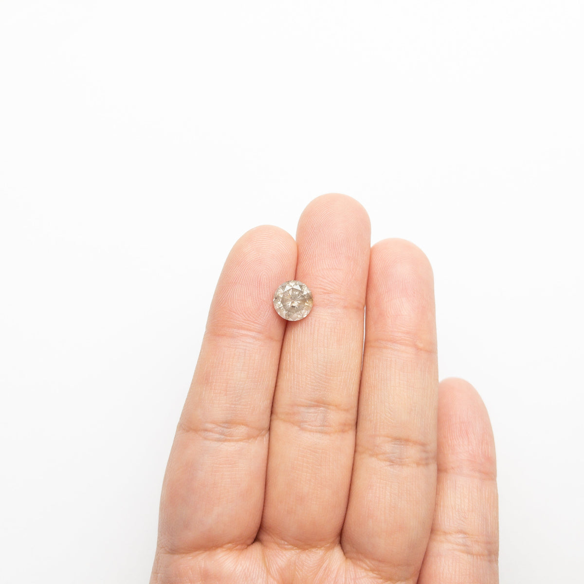 The 2.23ct 7.84x7.75x5.31mm Round Brilliant 20931-04 by East London jeweller Rachel Boston | Discover our collections of unique and timeless engagement rings, wedding rings, and modern fine jewellery.