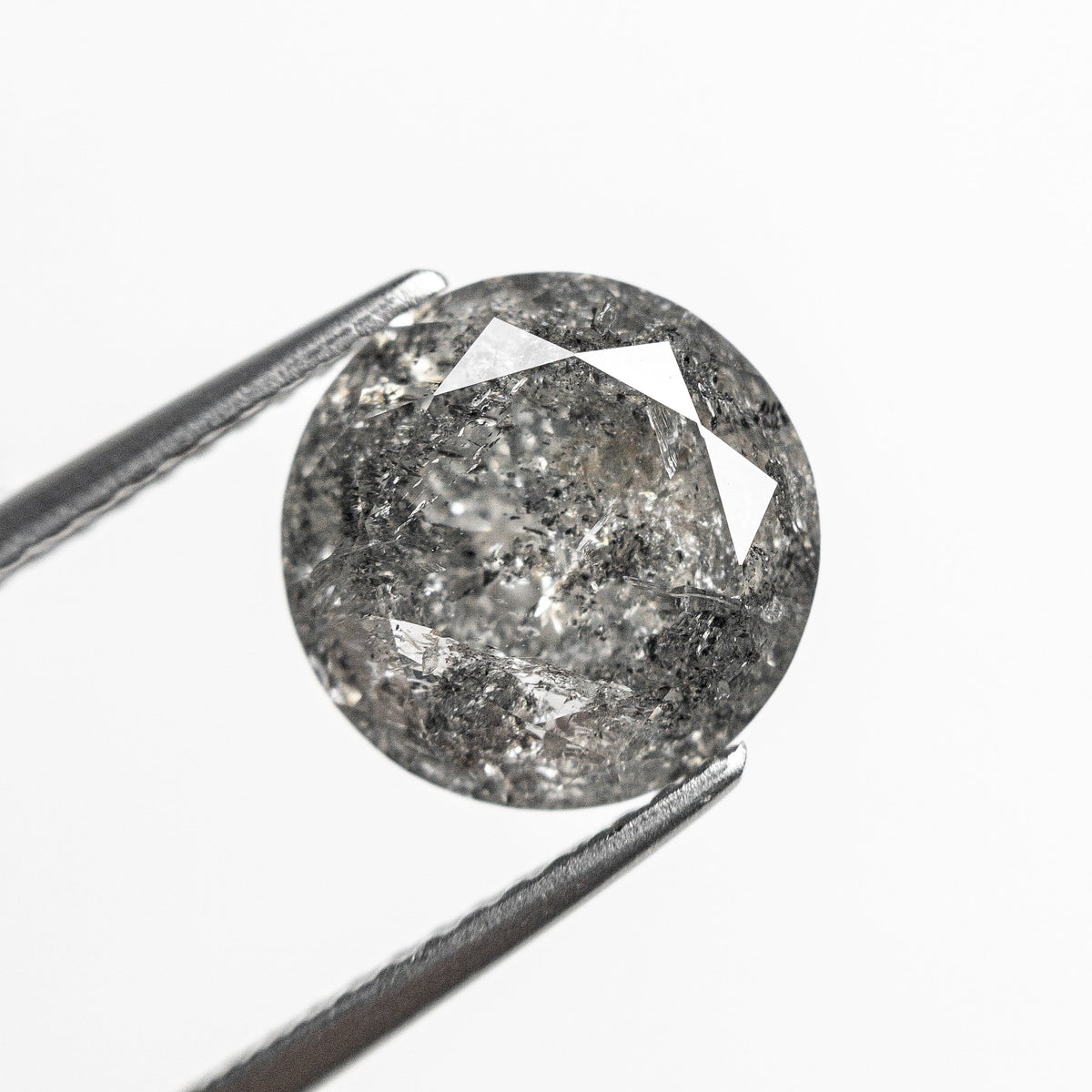 The 3.01ct 9.36x9.34x5.29mm Round Brilliant 20931-08 by East London jeweller Rachel Boston | Discover our collections of unique and timeless engagement rings, wedding rings, and modern fine jewellery.