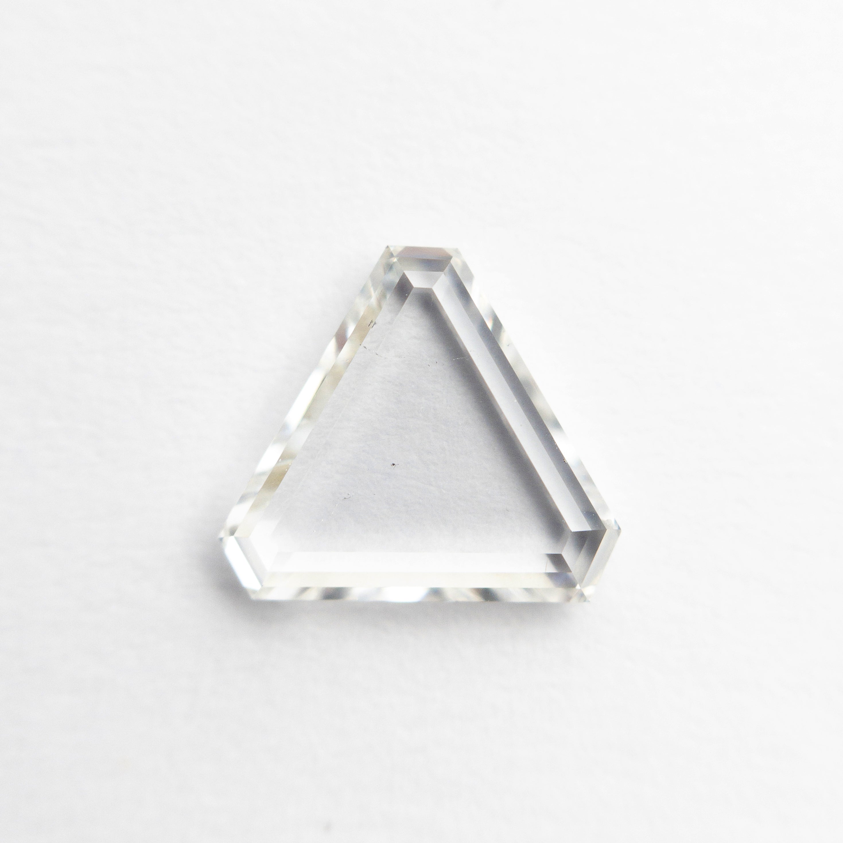 The 1.21ct 7.61x7.57x1.99mm SI2 G Cut Corner Triangle Portrait Cut 20939-03 by East London jeweller Rachel Boston | Discover our collections of unique and timeless engagement rings, wedding rings, and modern fine jewellery.