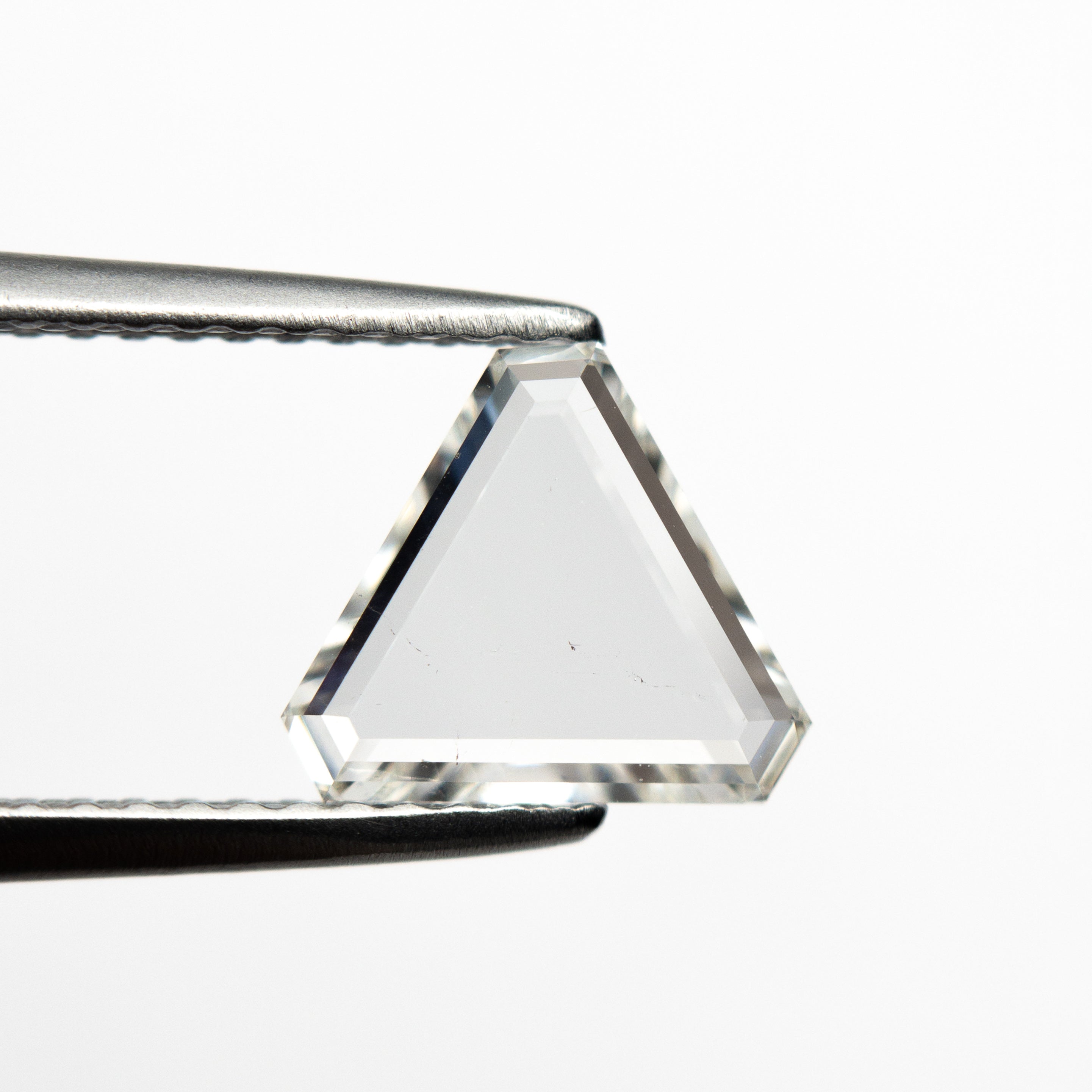 The 1.21ct 7.61x7.57x1.99mm SI2 G Cut Corner Triangle Portrait Cut 20939-03 by East London jeweller Rachel Boston | Discover our collections of unique and timeless engagement rings, wedding rings, and modern fine jewellery.