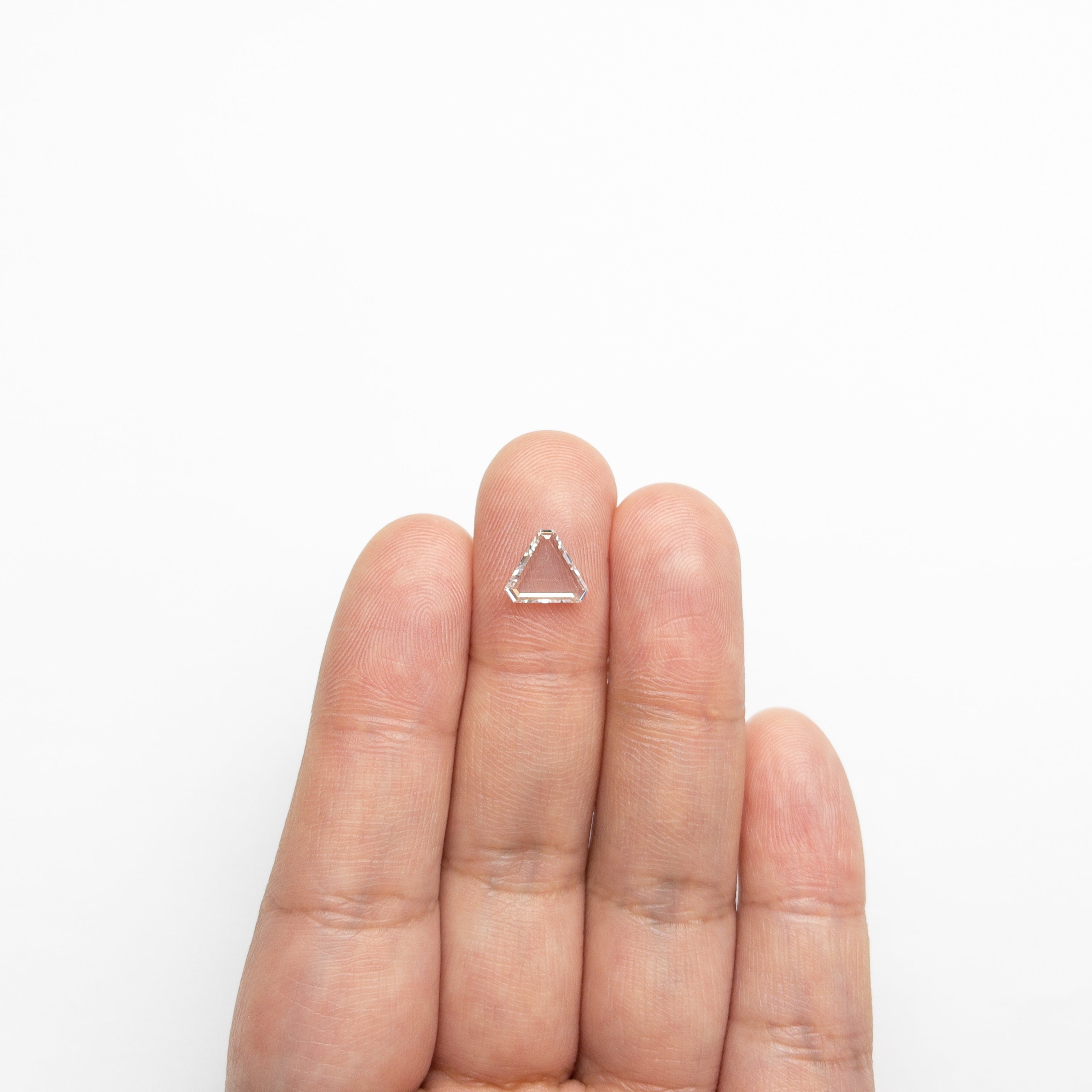 The 1.21ct 7.61x7.57x1.99mm SI2 G Cut Corner Triangle Portrait Cut 20939-03 by East London jeweller Rachel Boston | Discover our collections of unique and timeless engagement rings, wedding rings, and modern fine jewellery.
