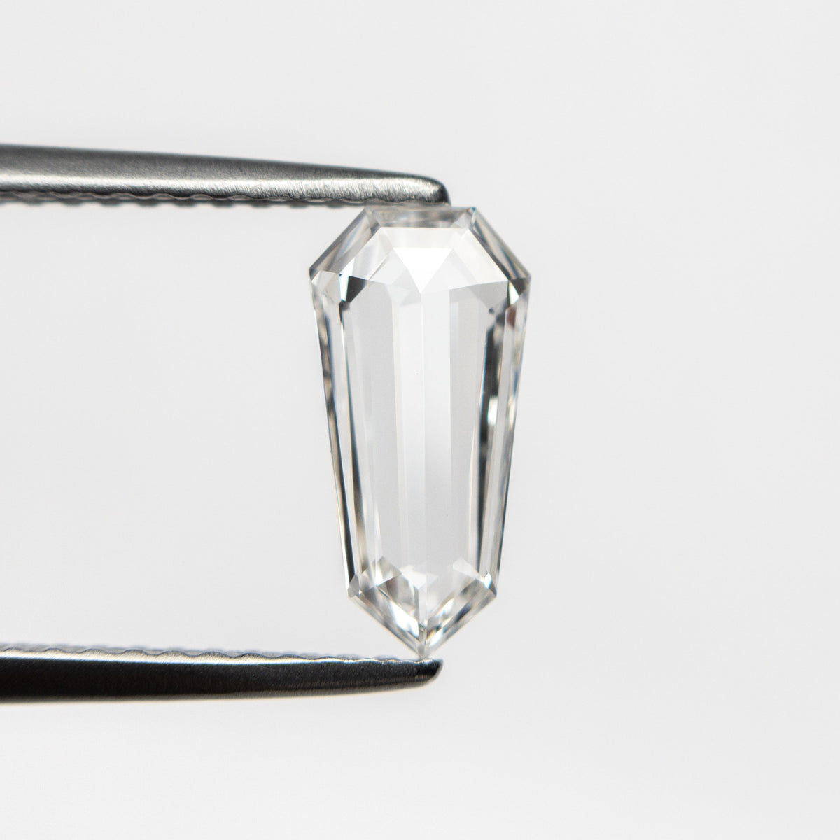 The 0.75ct 10.24x5.07x1.70mm VS2 E Shield Rosecut 20939-05 by East London jeweller Rachel Boston | Discover our collections of unique and timeless engagement rings, wedding rings, and modern fine jewellery.