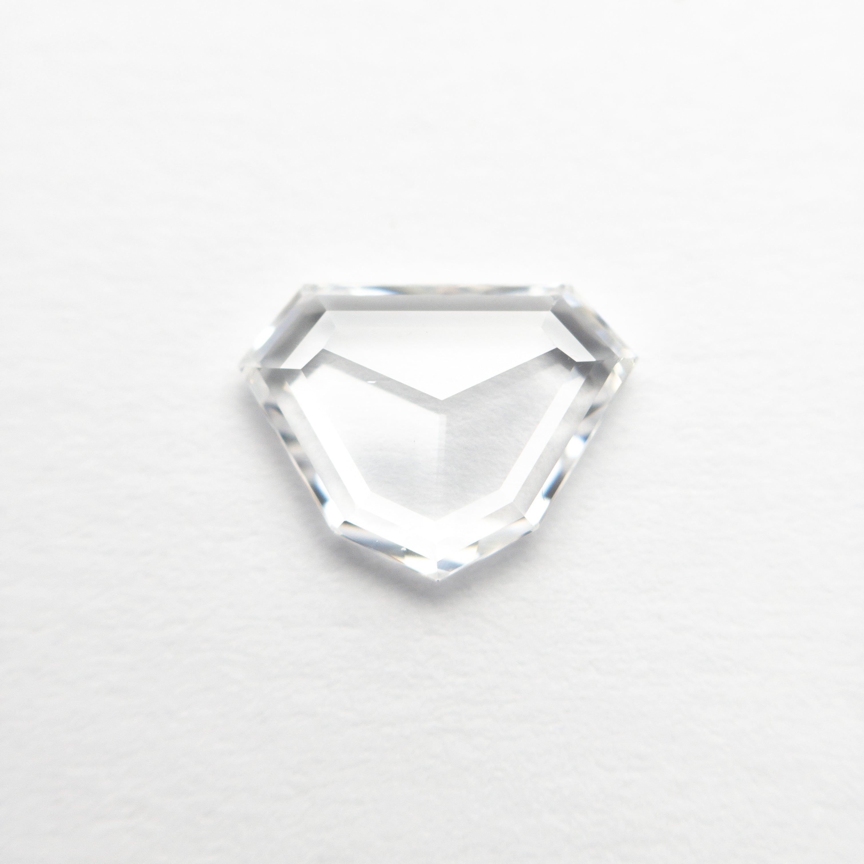 The 0.99ct 8.89x6.63x1.75mm VS1 E Shield Rosecut 20939-06 by East London jeweller Rachel Boston | Discover our collections of unique and timeless engagement rings, wedding rings, and modern fine jewellery.