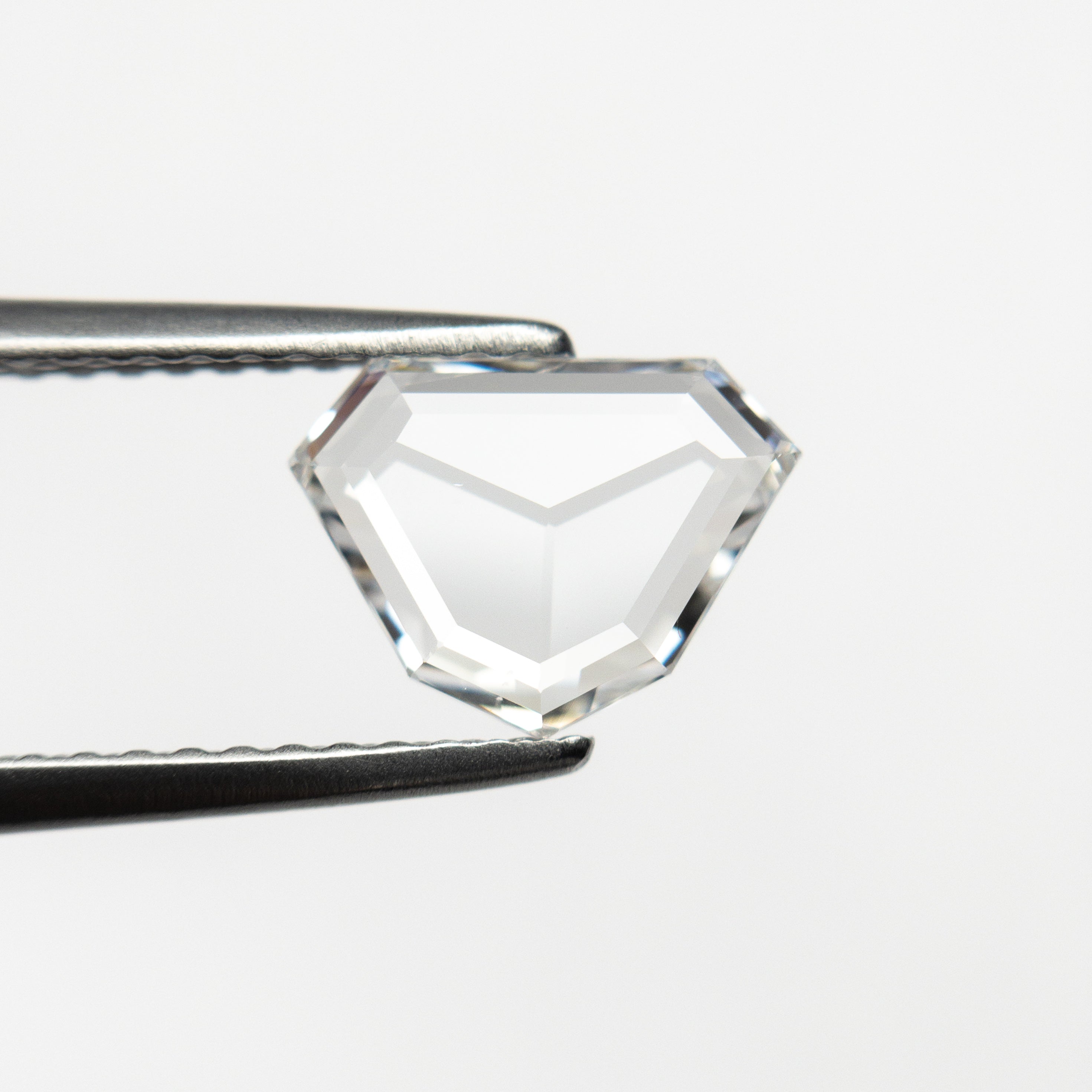 The 0.99ct 8.89x6.63x1.75mm VS1 E Shield Rosecut 20939-06 by East London jeweller Rachel Boston | Discover our collections of unique and timeless engagement rings, wedding rings, and modern fine jewellery.